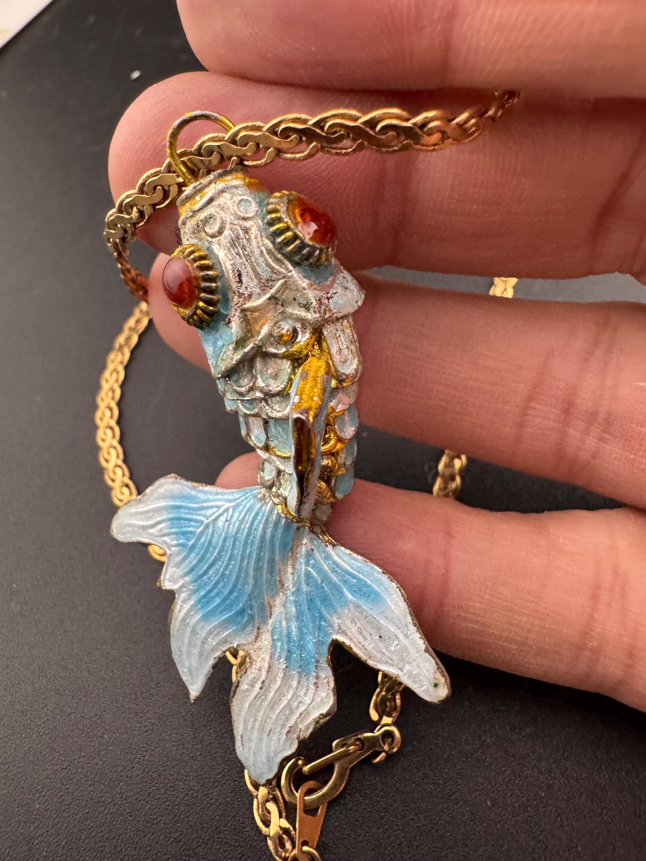 Vintage blue enamel articulated gold fish pendant on a 75 gold plated serpentine chain