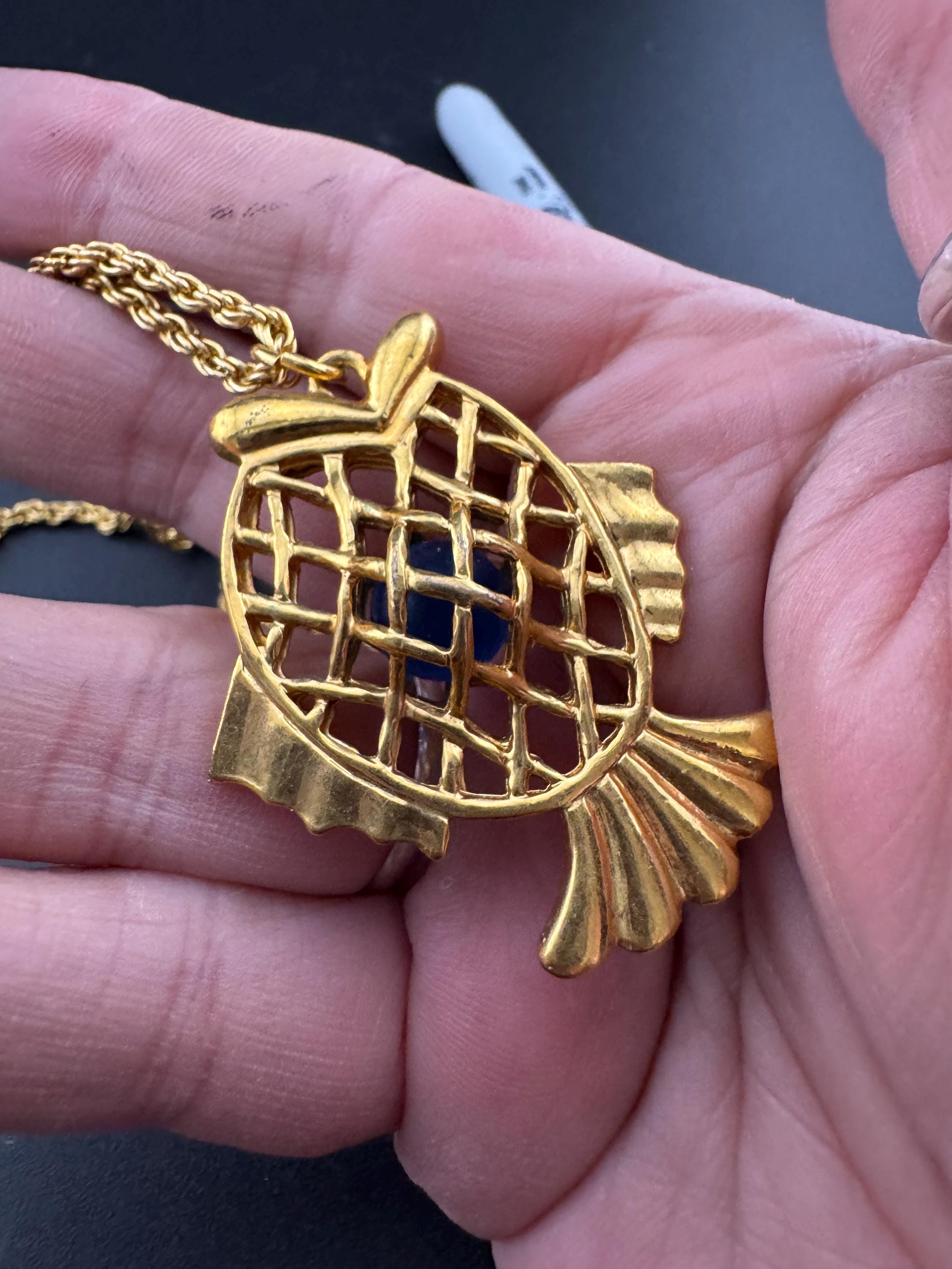 Vintage blue beaded woven caged gold fish pendant on a 75 gold plated rope chain