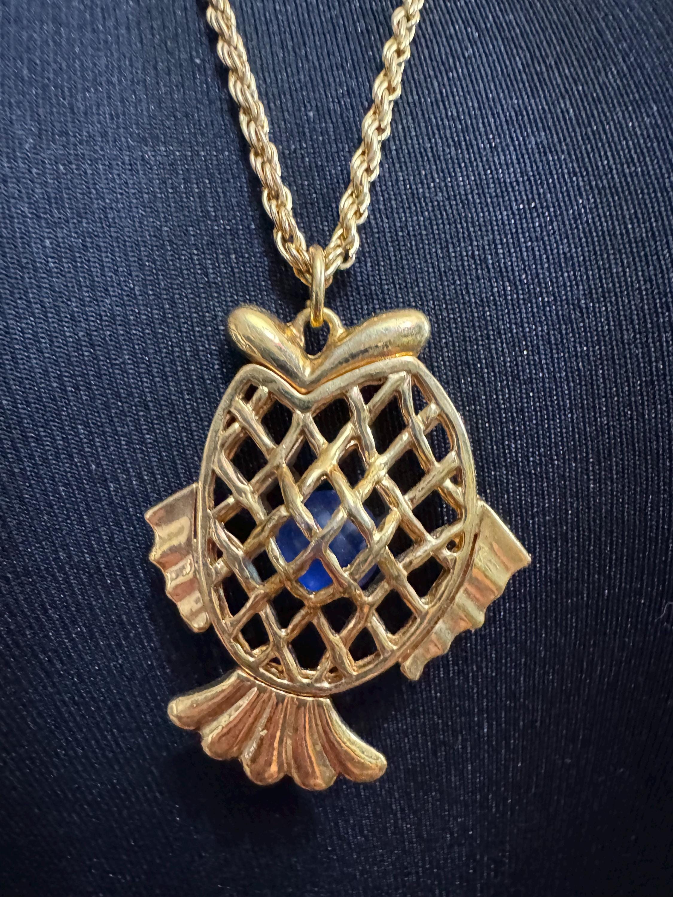 Vintage blue beaded woven caged gold fish pendant on a 75 gold plated rope chain