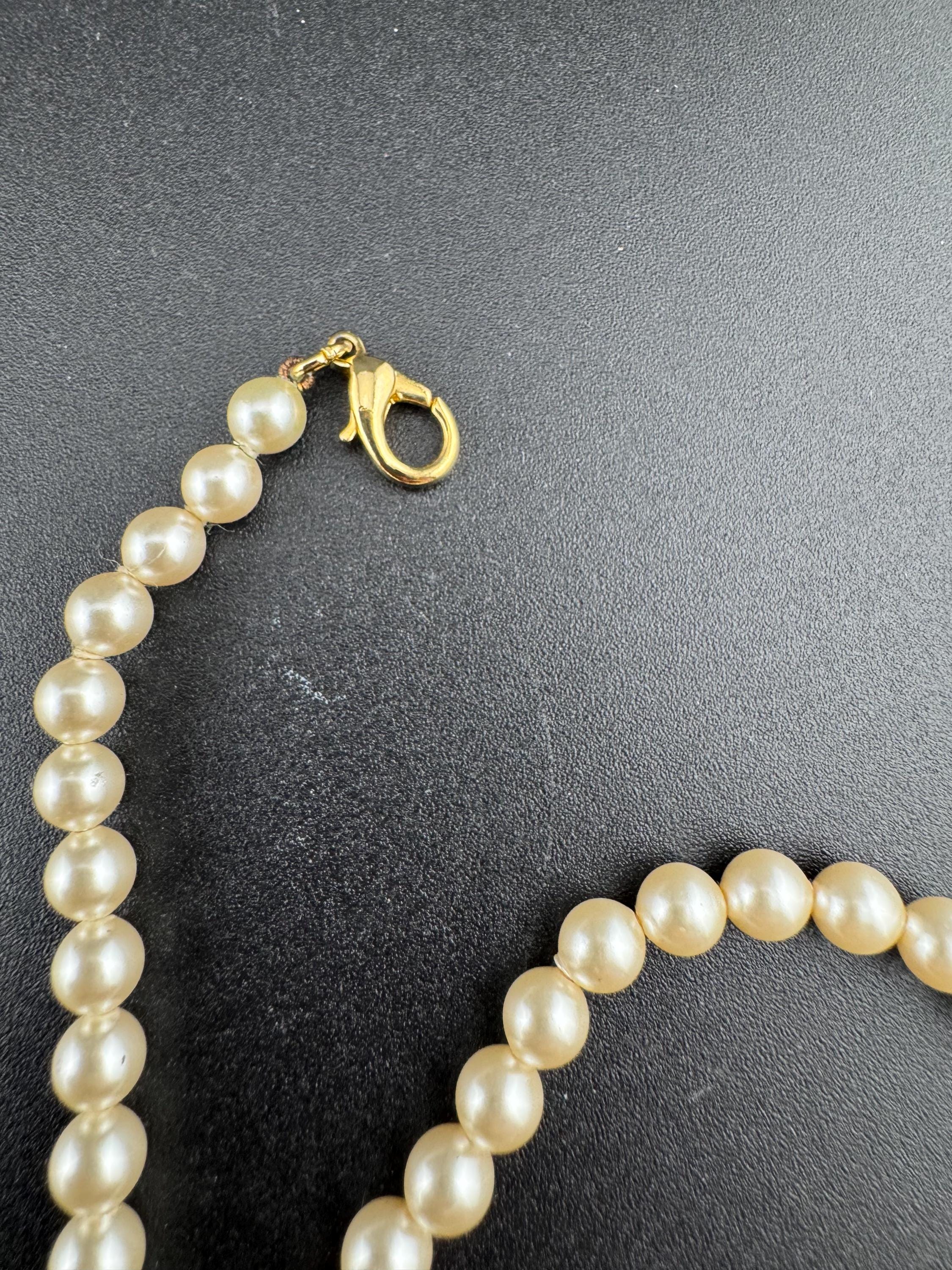 Signed Rosita cream glass pearl necklace with teardrop pendant, single strand row of pearls gold tone