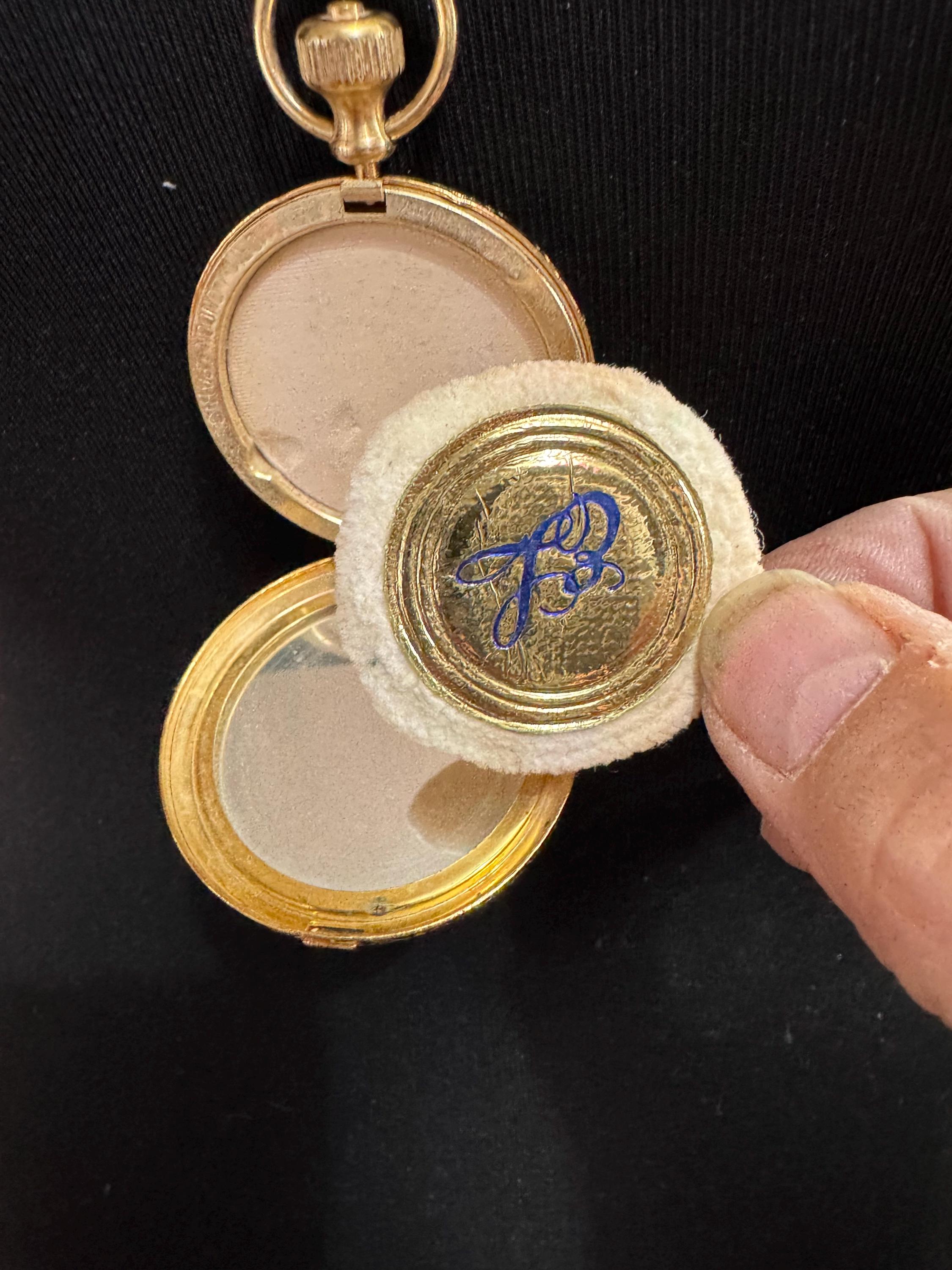 Vintage Estee Lauder ptessed powder pendant necklace gold tone medalion style