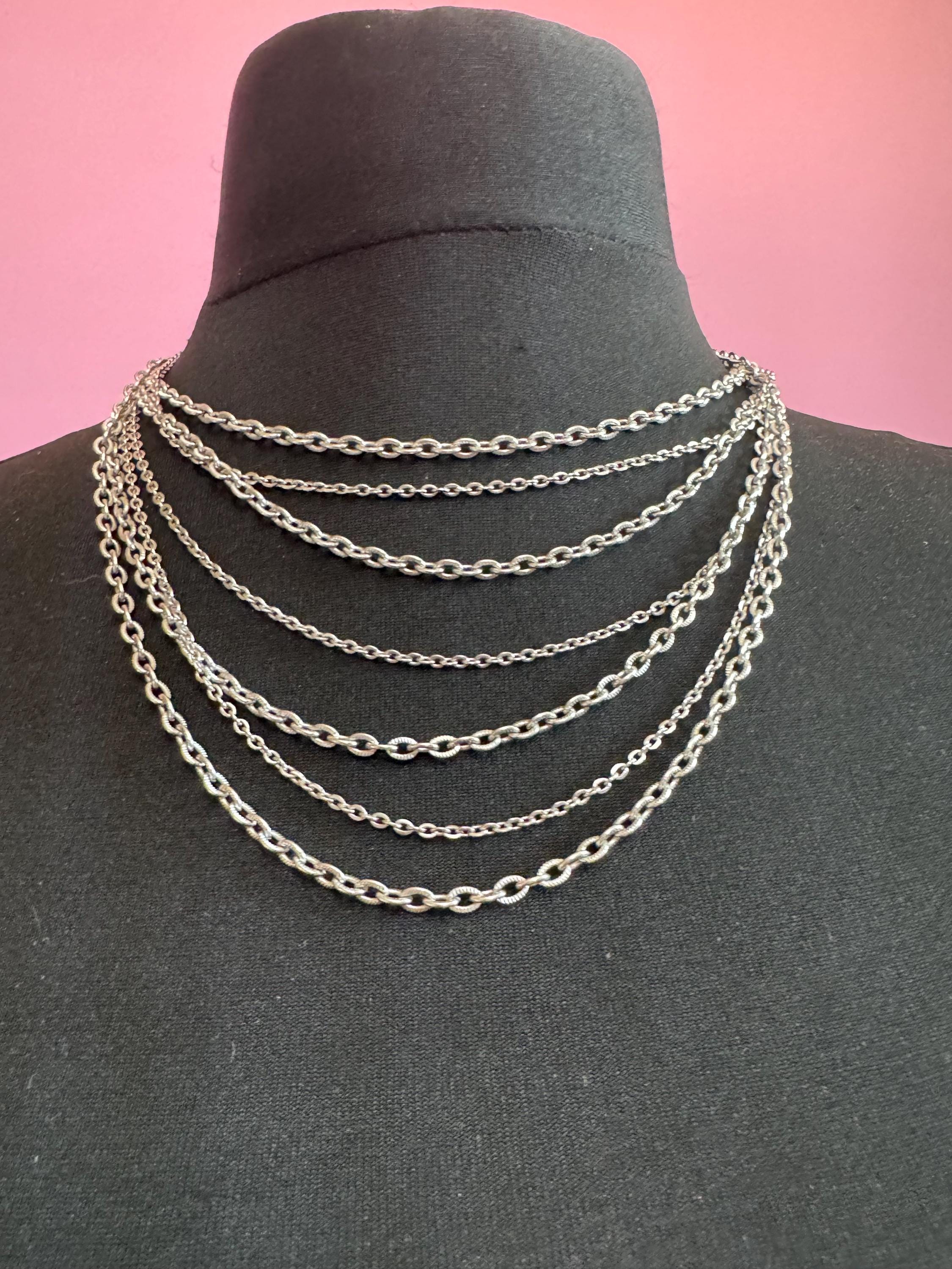 Signed Avon Vintage silver tone multi strand necklace and matching bracelet jewellery set