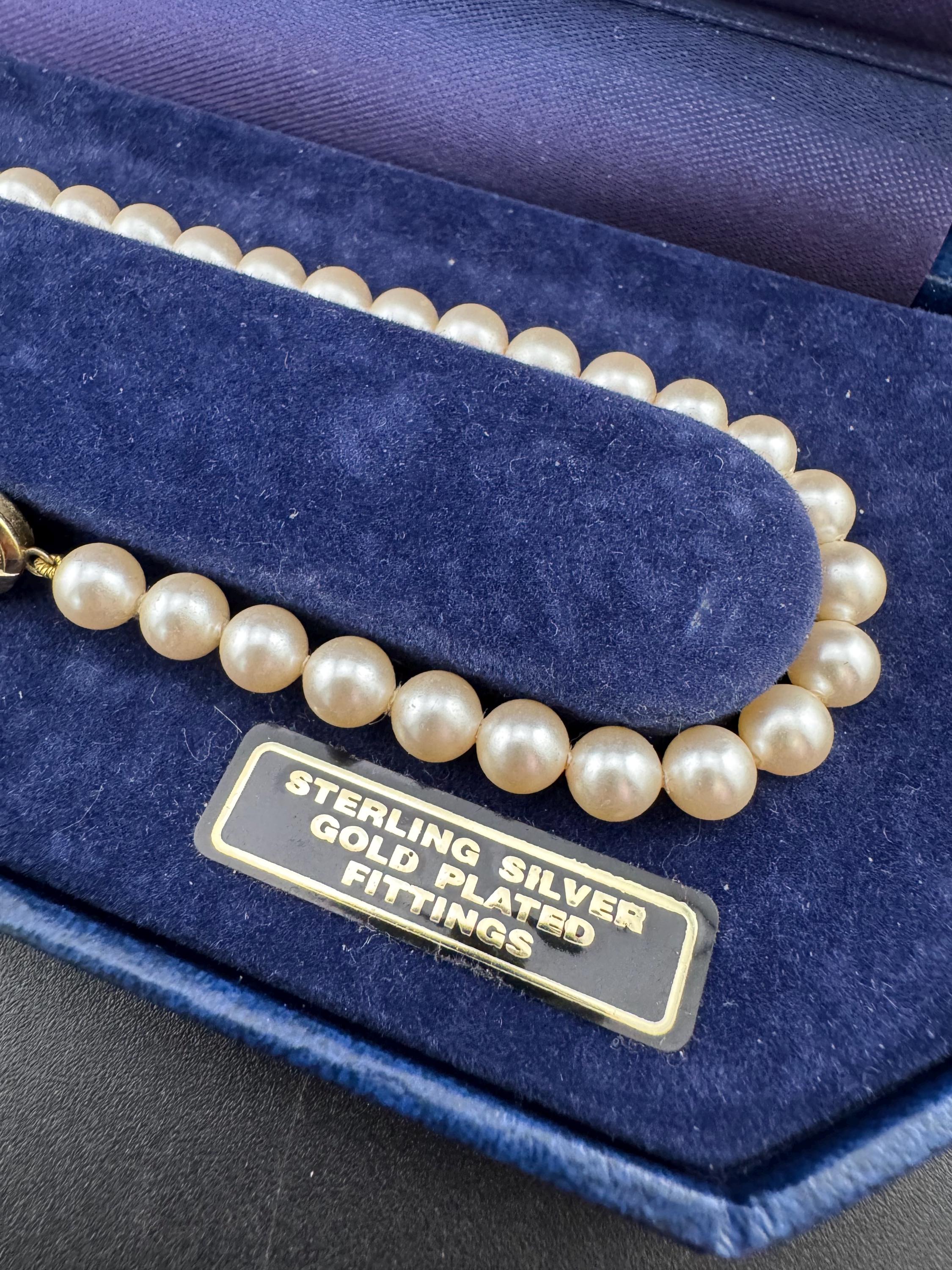 Vintage Cream Glass Pearl Necklace: Gold Plated Sterling Silver Clasp