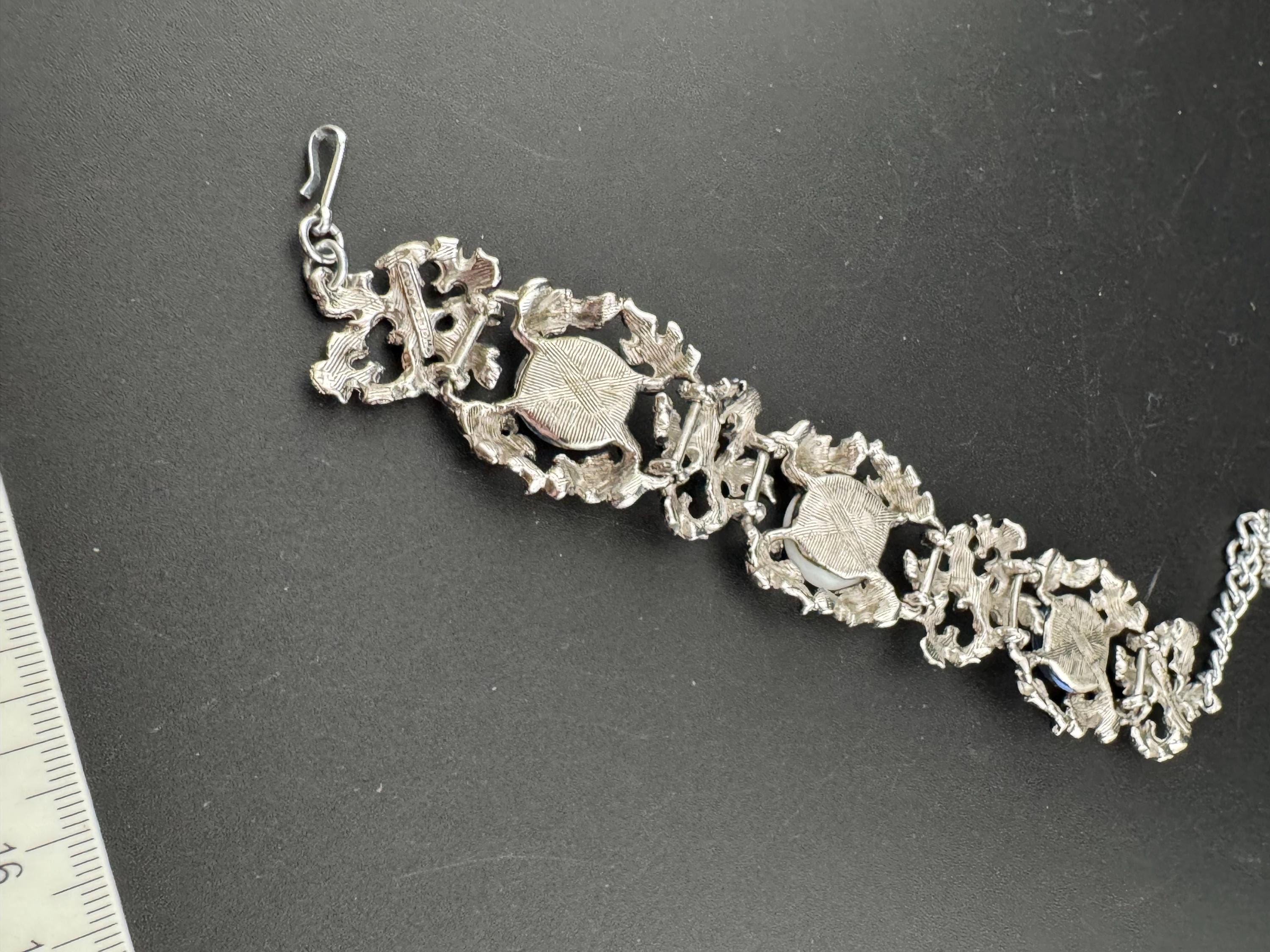 Signed Hollywood Vintage Brutalist silver tone textured blue and white cabochon chain link bracelet
