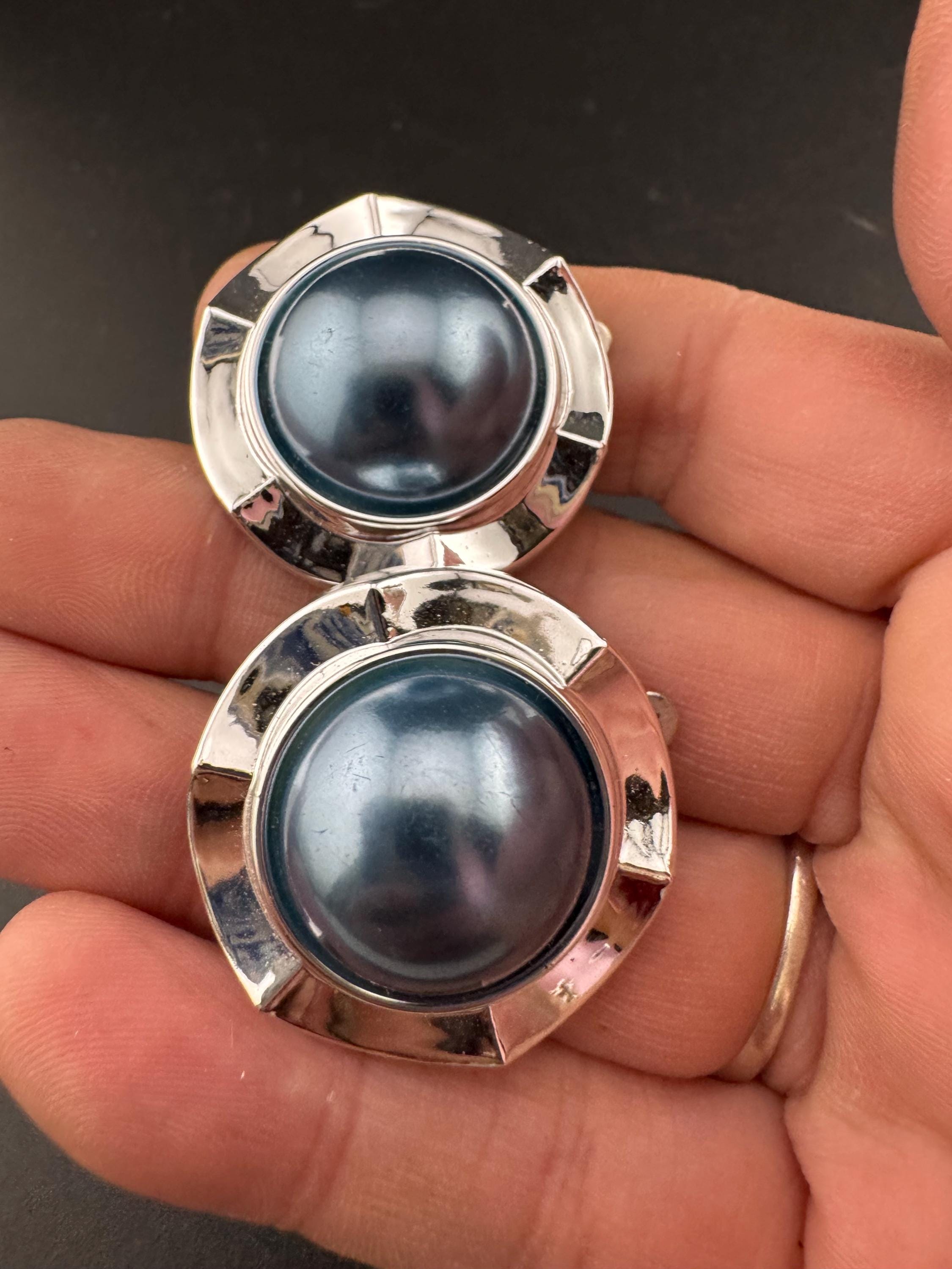 Vintage silver tone metal 2.5cm round clip on domed earrings with central faux grey blue faux pearl cabochons