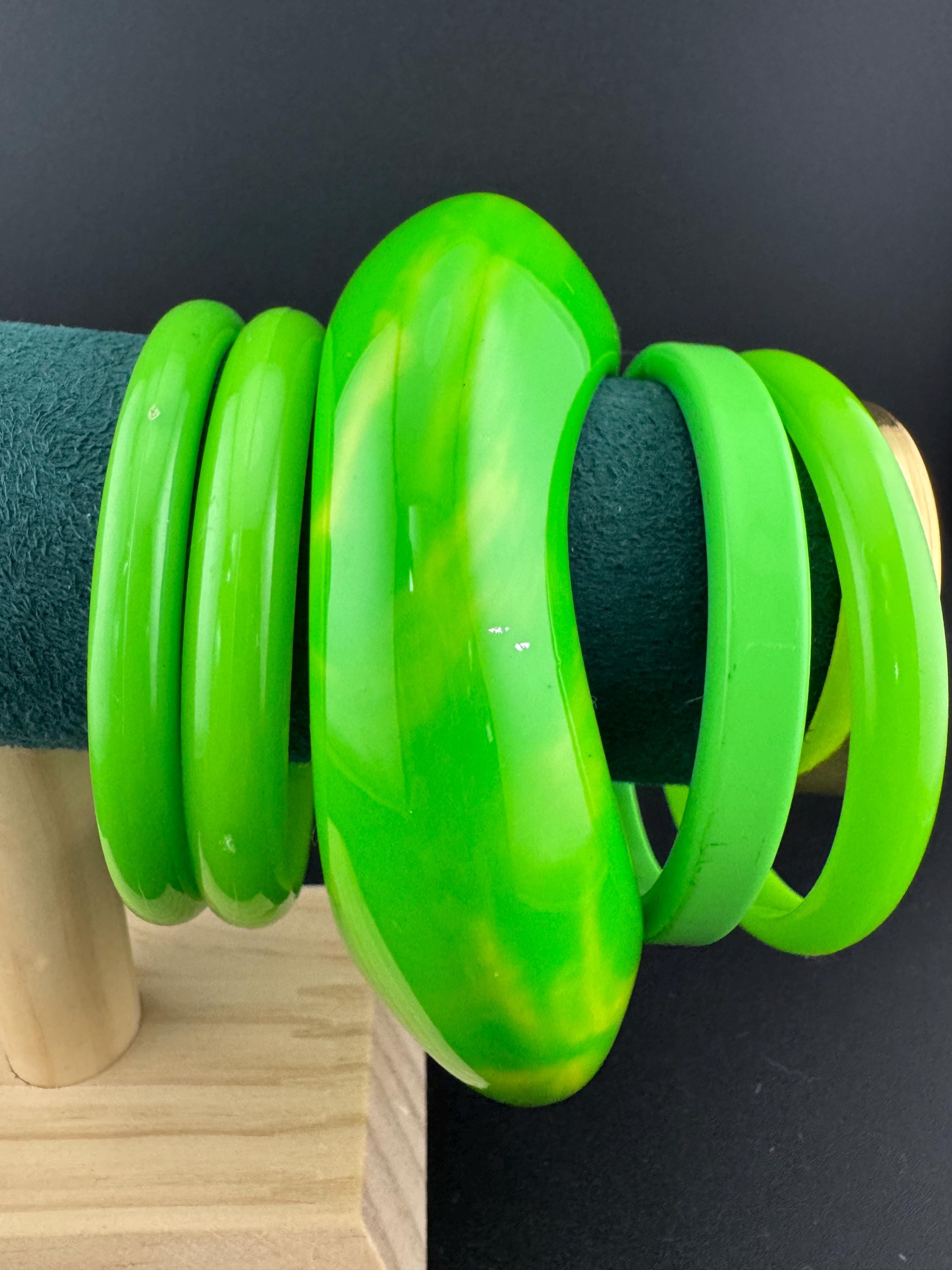 Vintage and retro curated stack of GREEN plastic acrylic bangles, bracelets