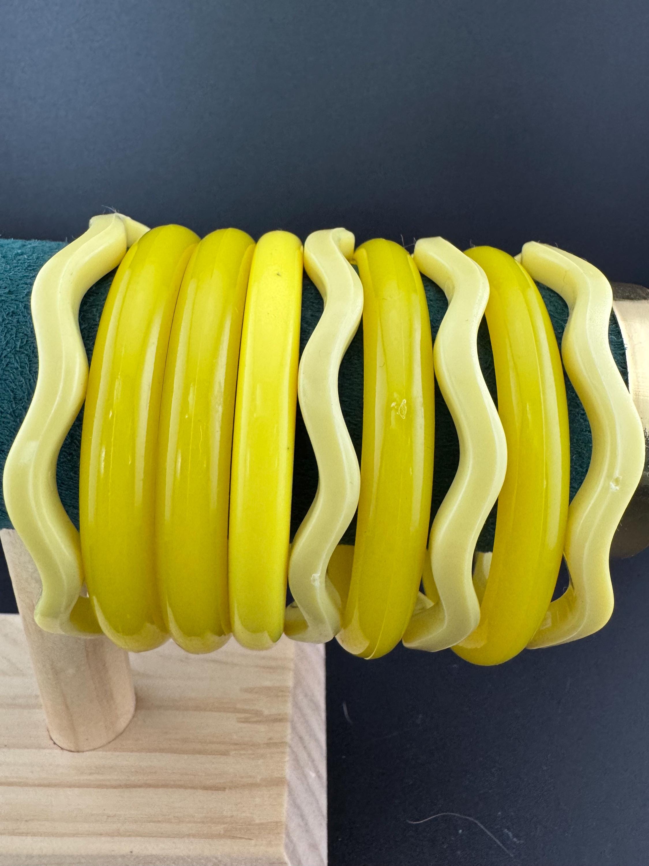Vintage curated stack of YELLOW plastic bangles retro acrylic bracelets