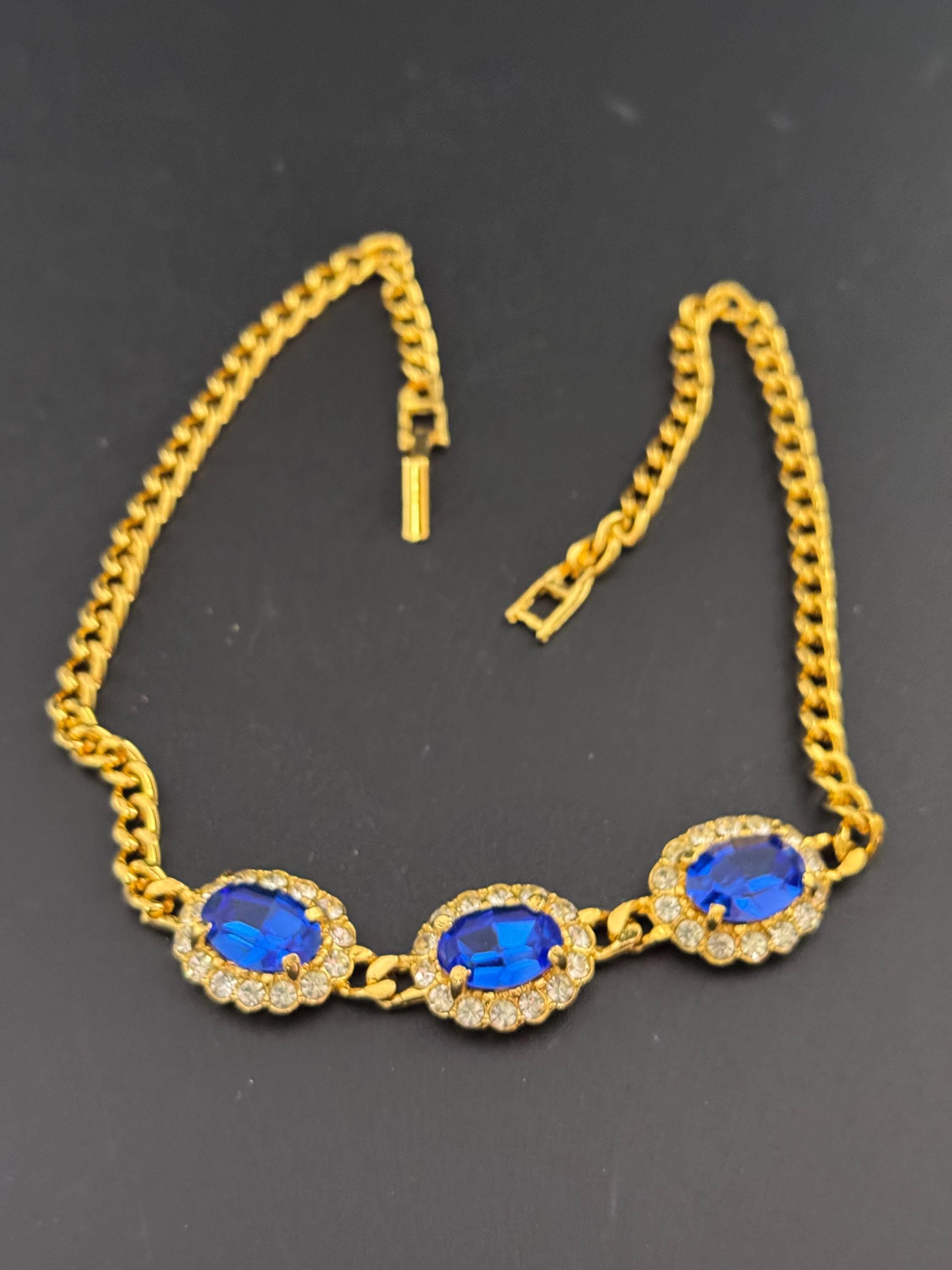 Vintage 1980s Swarovski crystal set triple sapphire blue and clear diamanté oval pendant necklace gold tone high end old shop stock