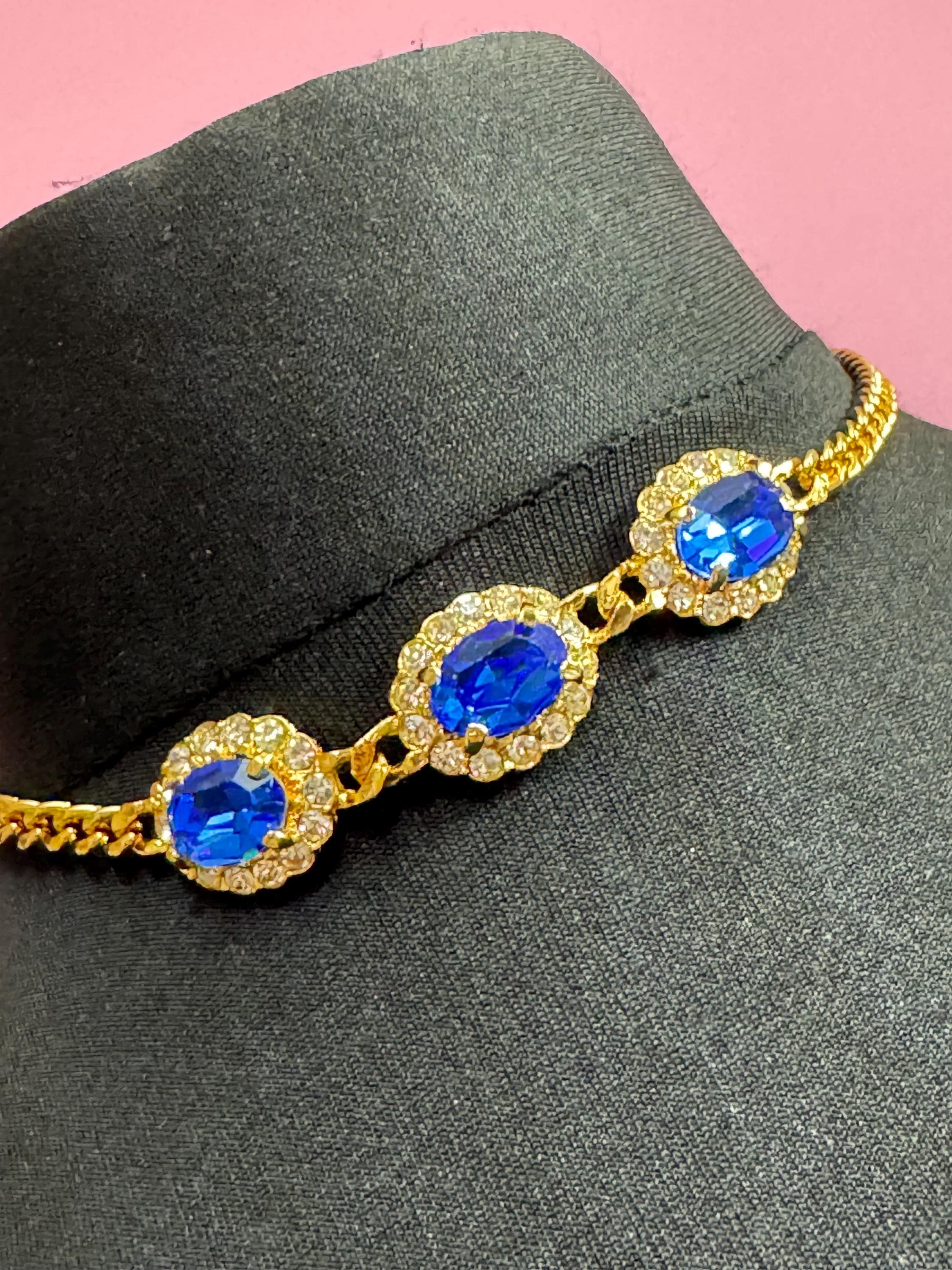 Vintage 1980s Swarovski crystal set triple sapphire blue and clear diamanté oval pendant necklace gold tone high end old shop stock