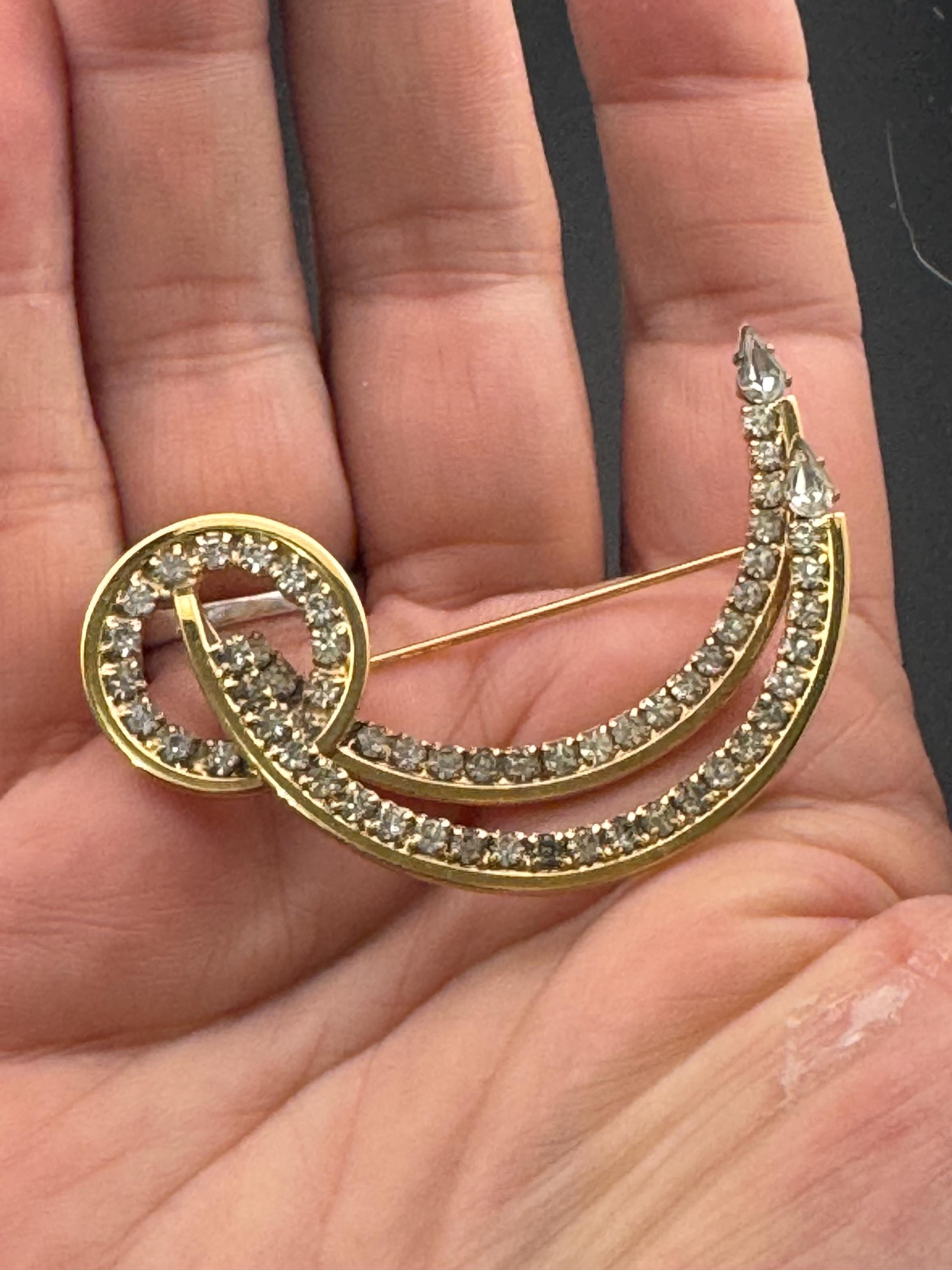 Large vintage stylish gold tone clear diamanté glass abstract swirl brooch