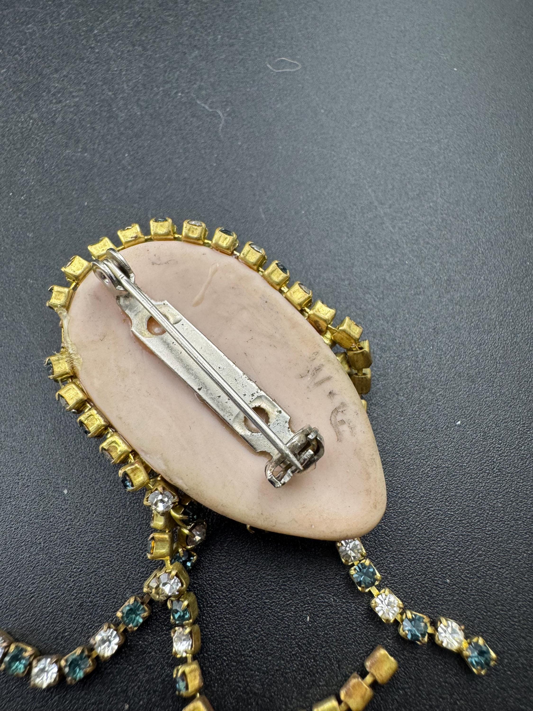 vintage 1980s green emerald  rhinestone flapper girl porcelain ladies face drop brooch