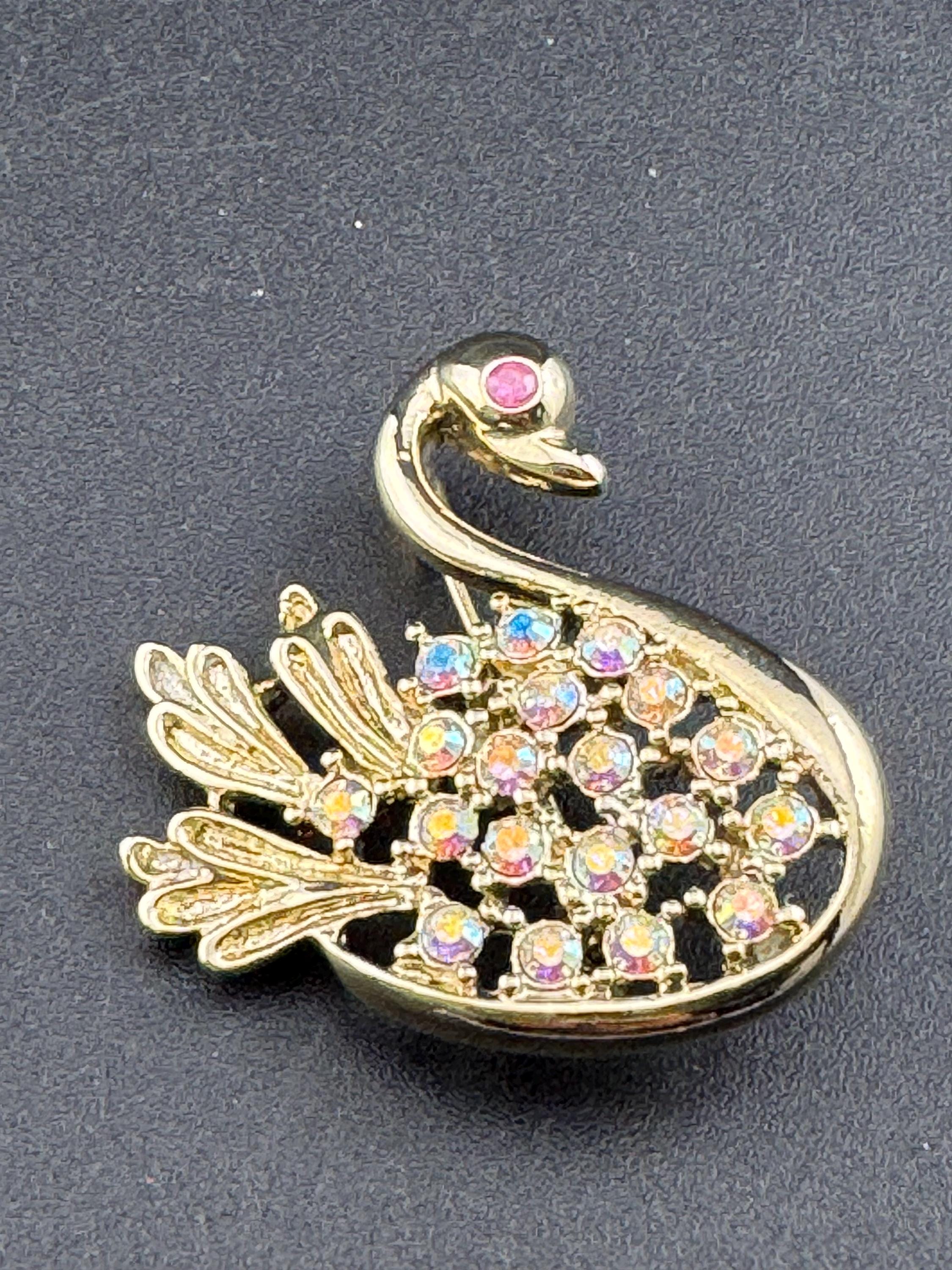 Signed JJI minimalist stylised Aurora borealis AB diamanté swan brooch gold tone