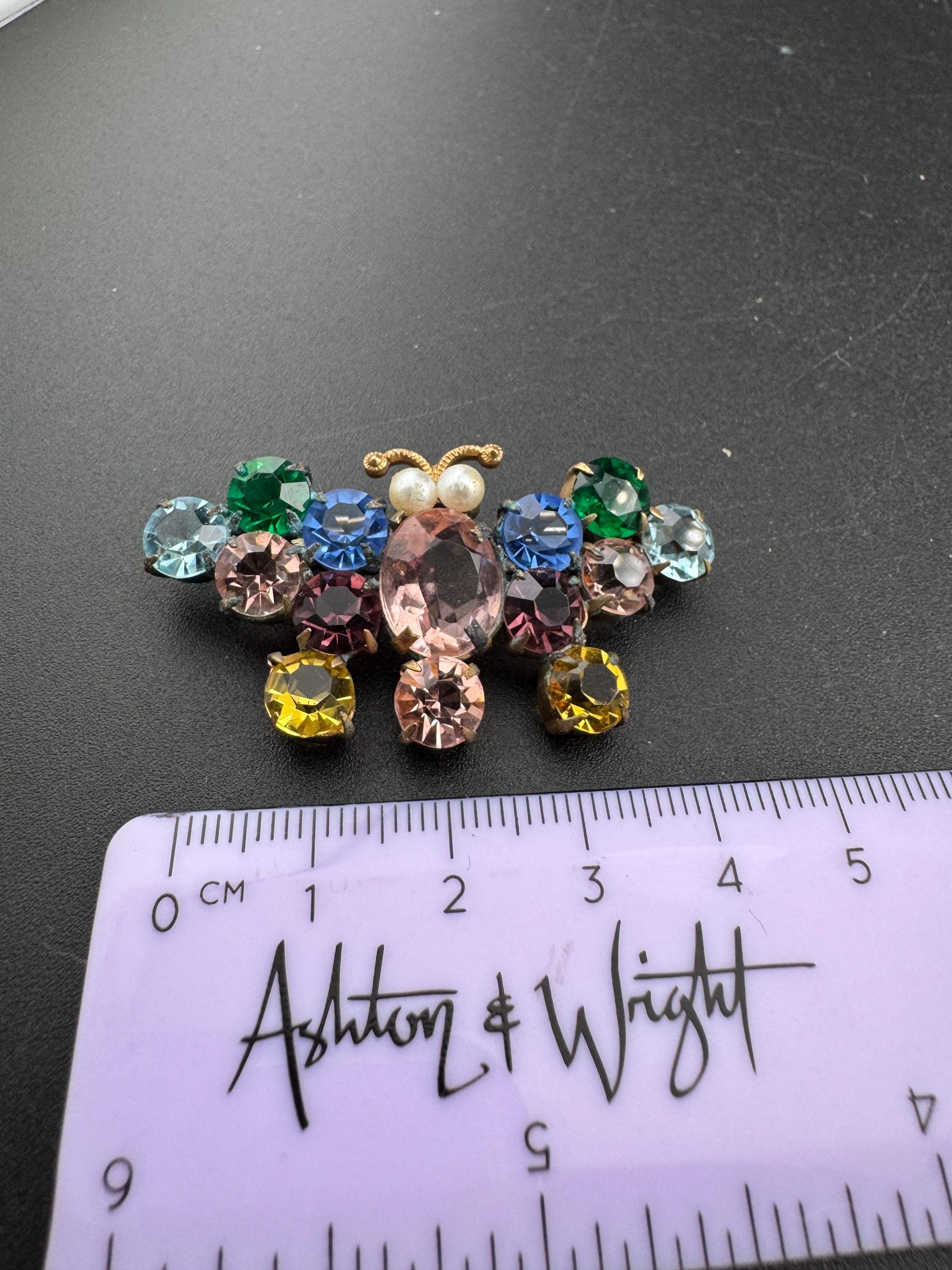 Antique Edwardian gold tone rainbow diamanté crystal butterfly brooch with faux pearls