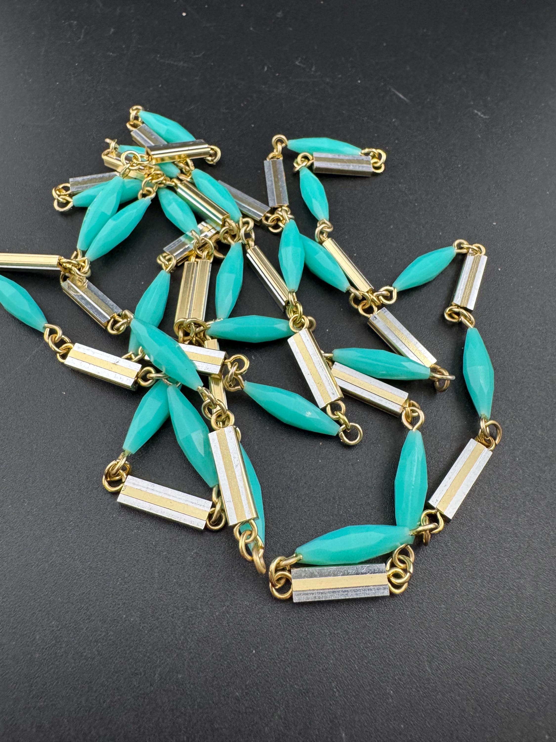 Vintage 60s 70s long plastic layering necklace. Turquoise blue beads with silver and gold tones