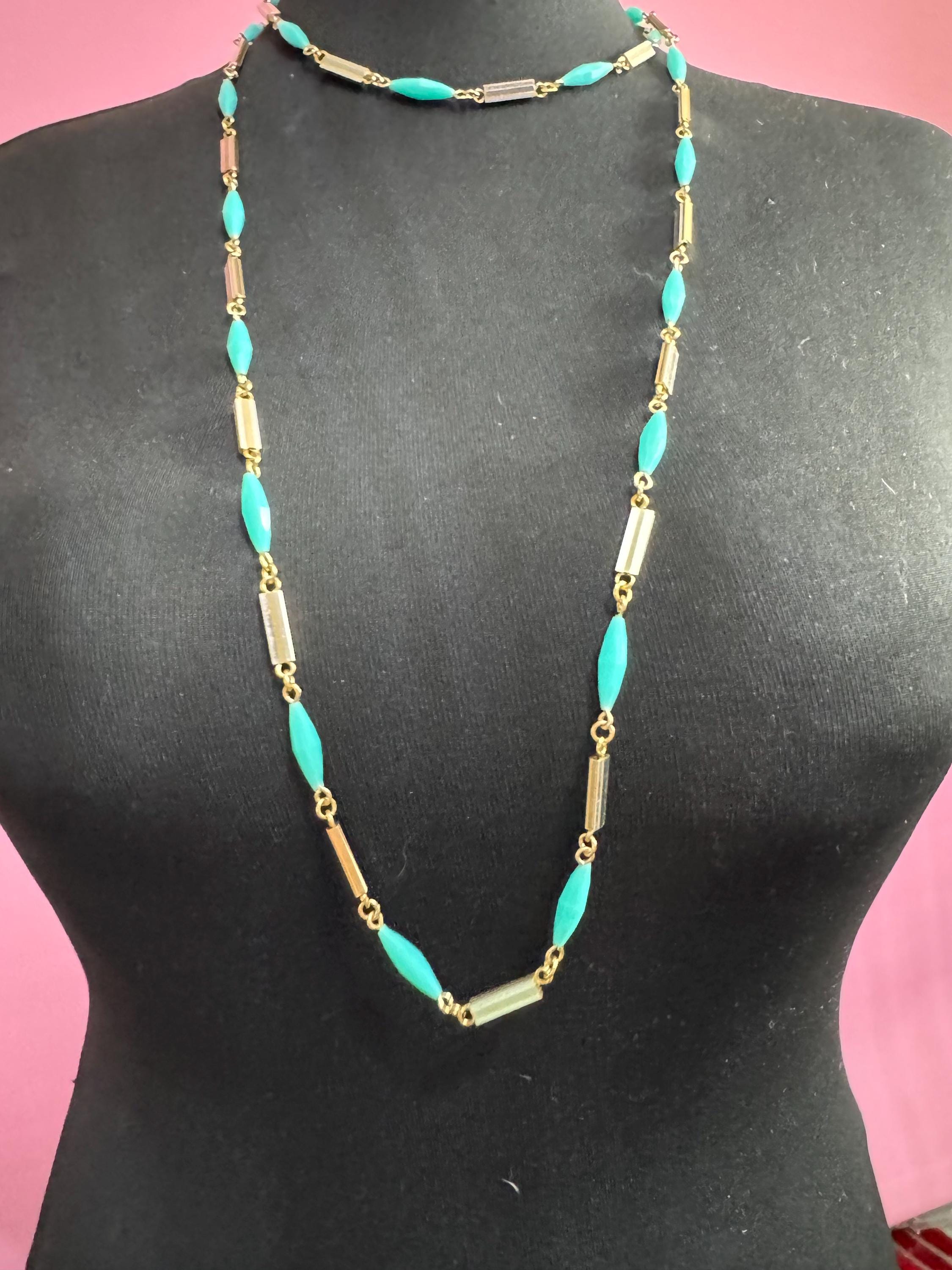 Vintage 60s 70s long plastic layering necklace. Turquoise blue beads with silver and gold tones