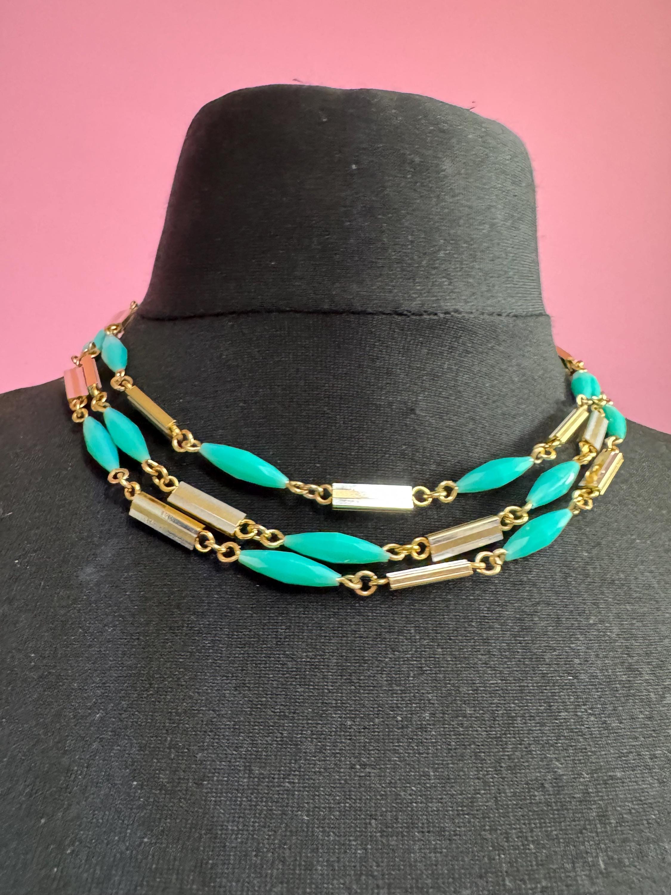 Vintage 60s 70s long plastic layering necklace. Turquoise blue beads with silver and gold tones