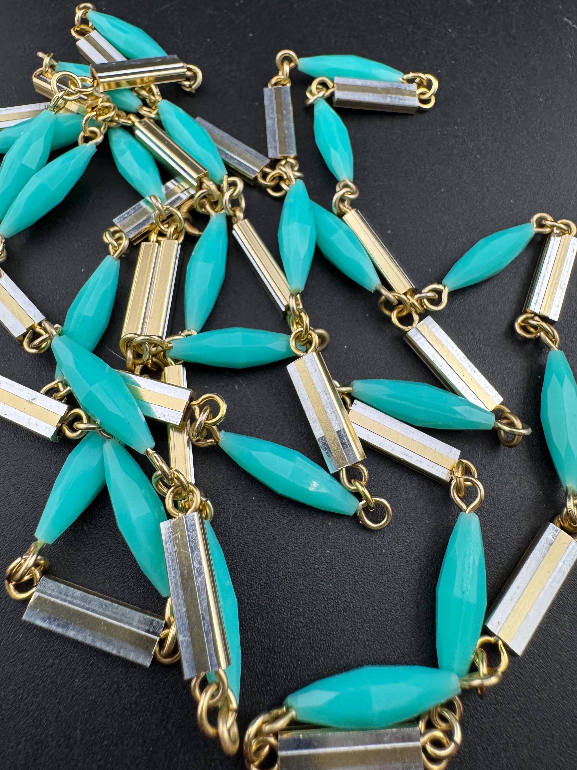Vintage 60s 70s long plastic layering necklace. Turquoise blue beads with silver and gold tones