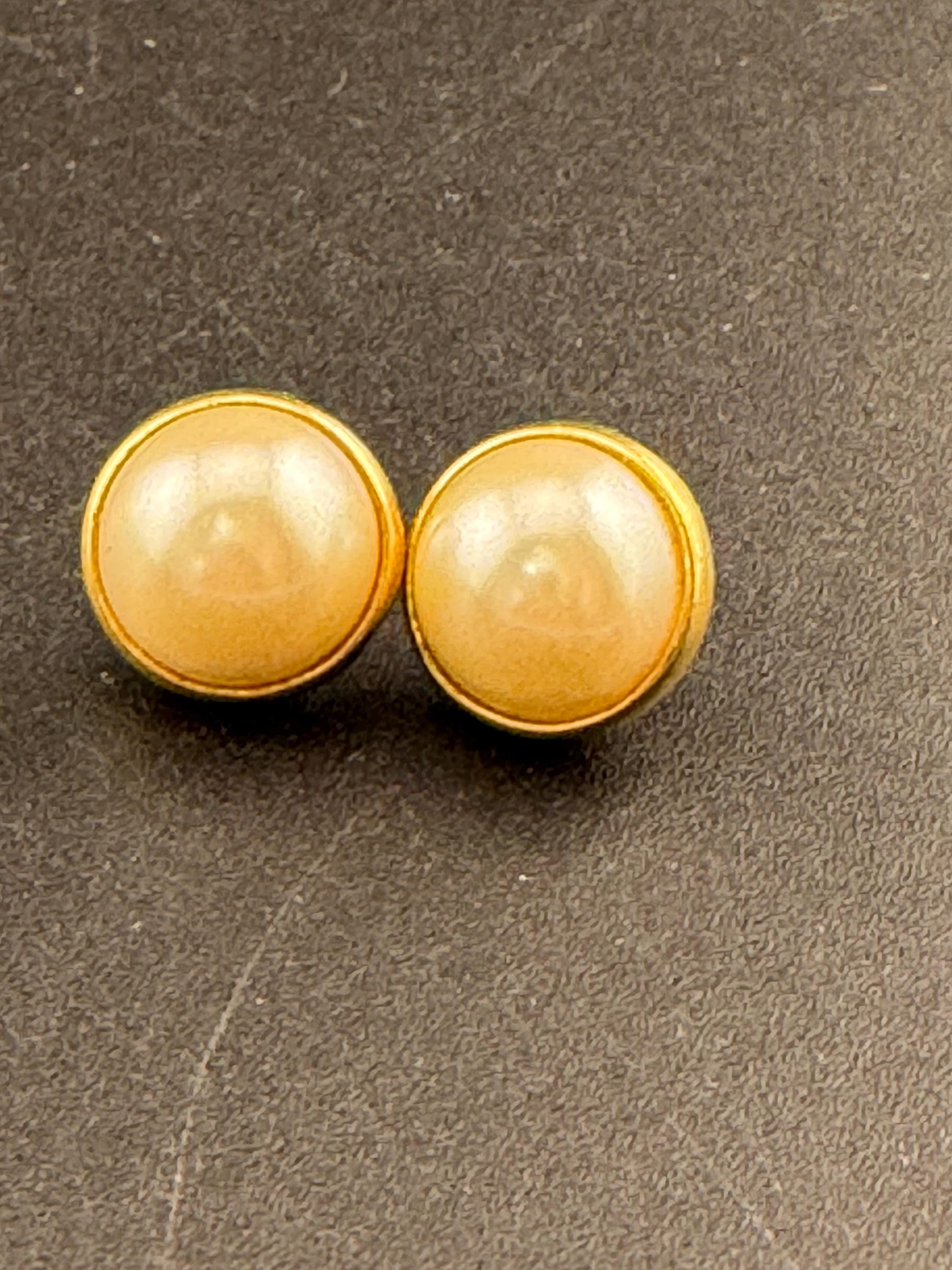 Vintage gold tone dainty 12mm small domed clip on earrings faux cream pearl cabochon 1980s