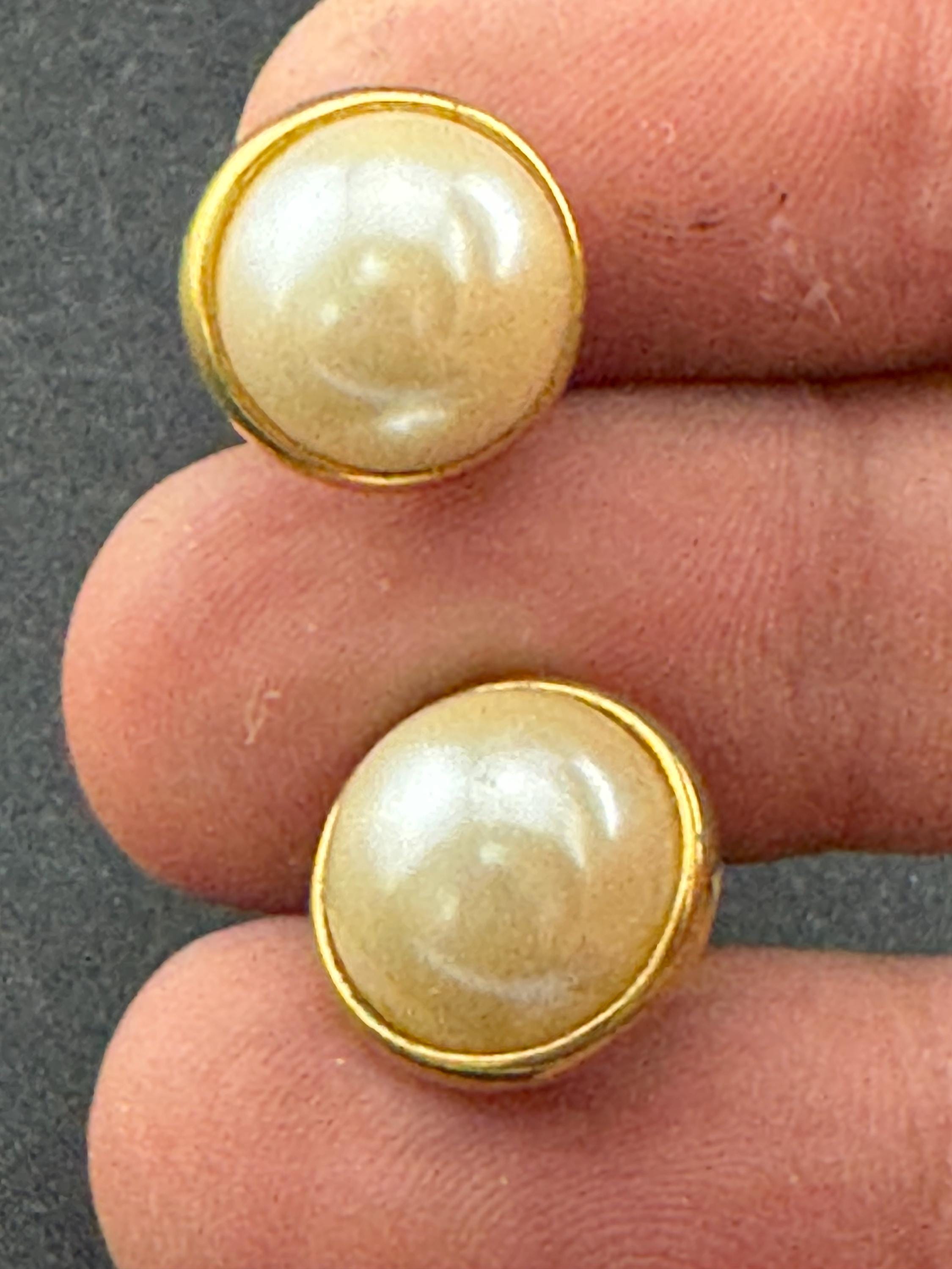 Vintage gold tone dainty 12mm small domed clip on earrings faux cream pearl cabochon 1980s