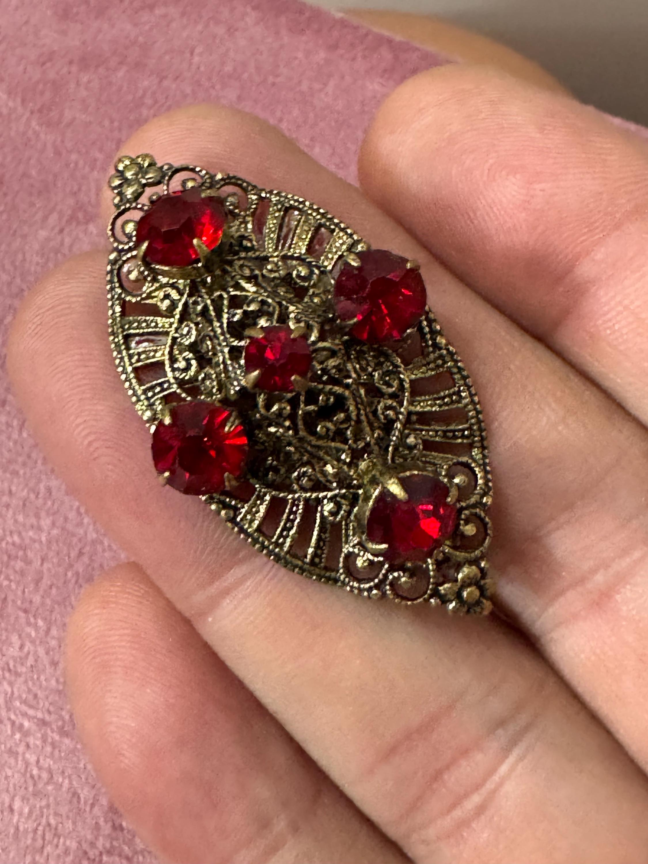 Antique Art Deco Czech brass gilt metal filigree brooch with red faux ruby glass paste rhinestones ornate