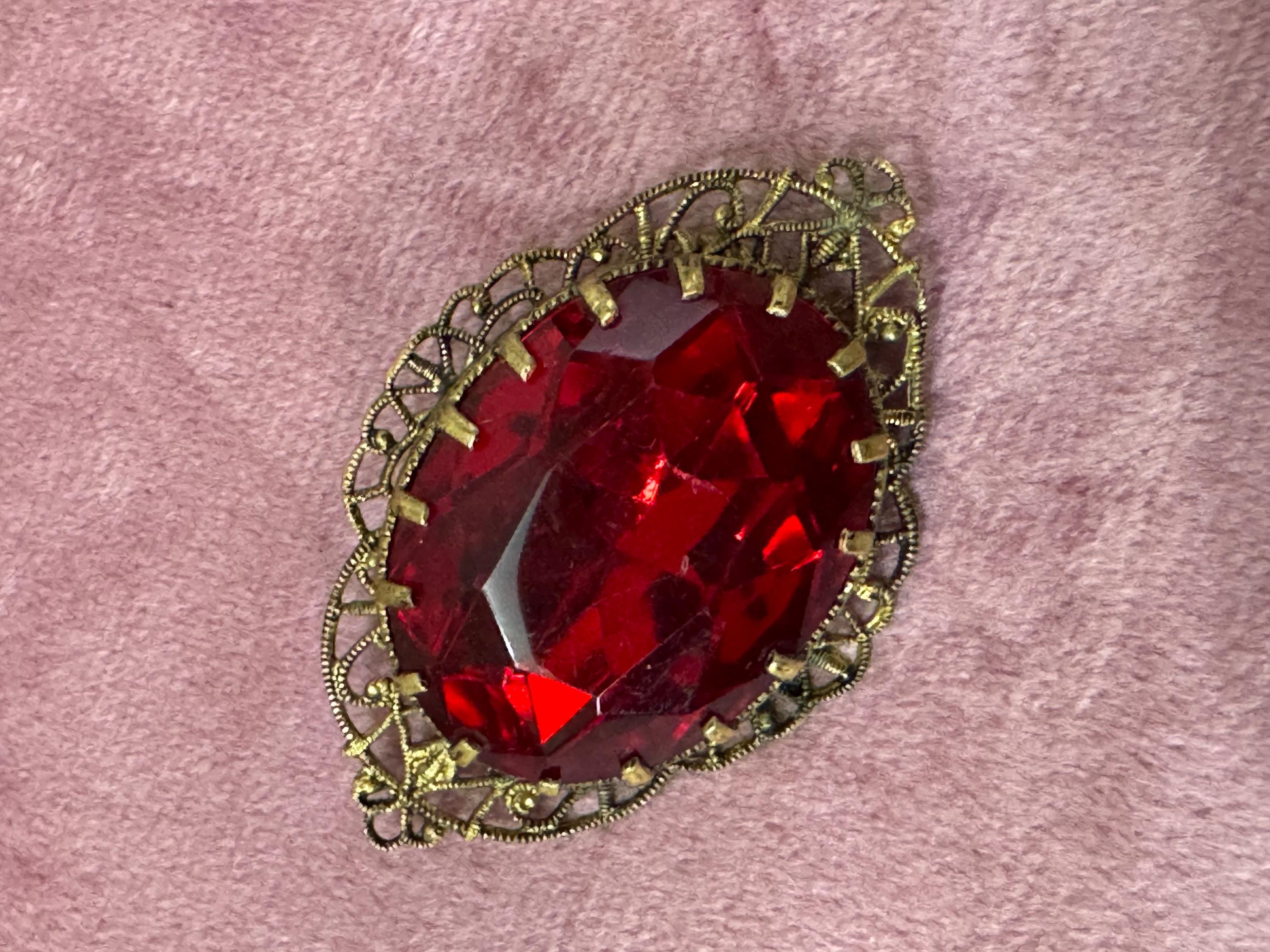 Antique Art Deco Czech brass gilt metal filigree brooch with red faux ruby glass paste rhinestones ornate
