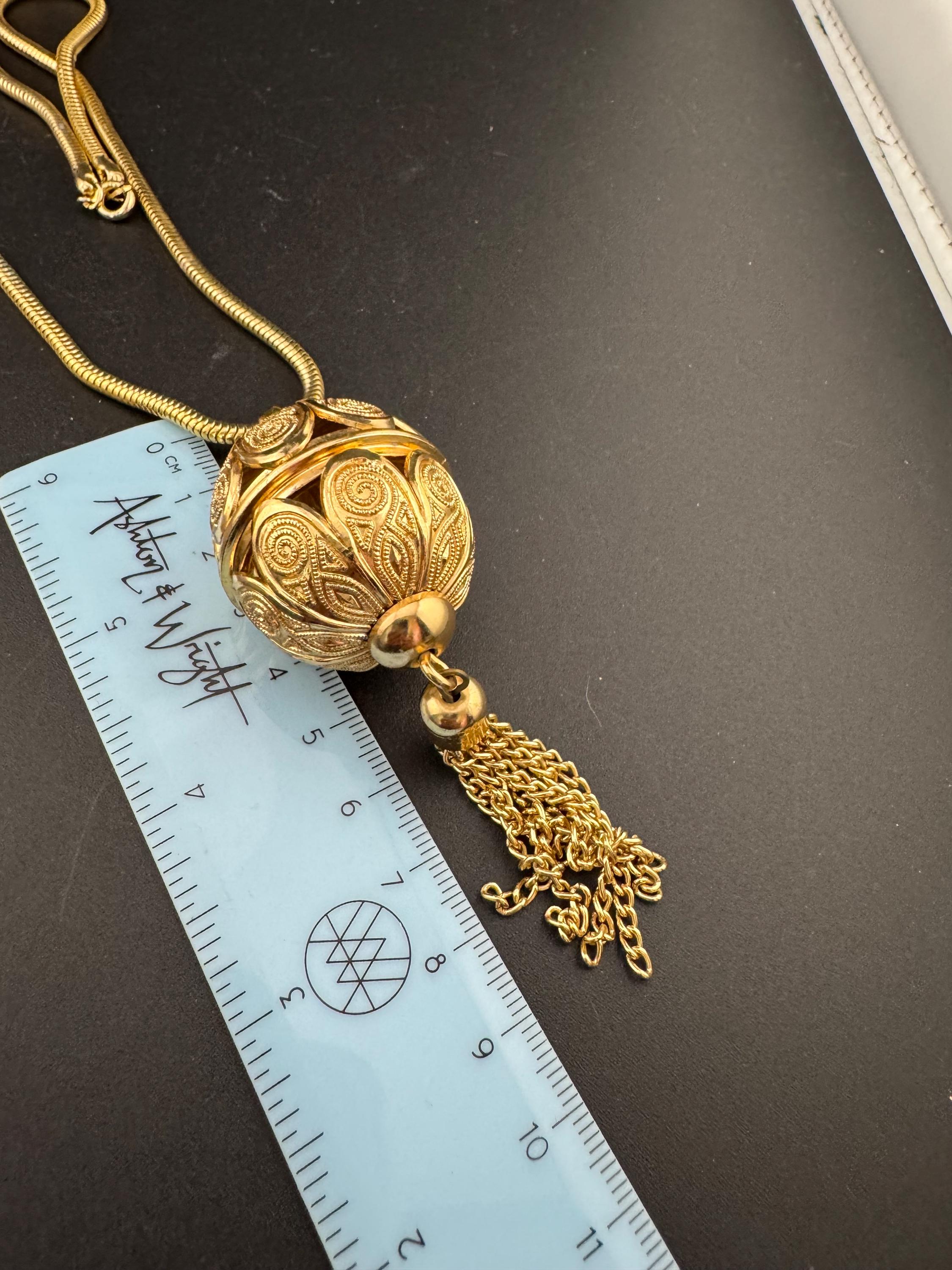 Vintage long round tube mesh link gold tone ornate cage ball tassel pendant necklace 70s