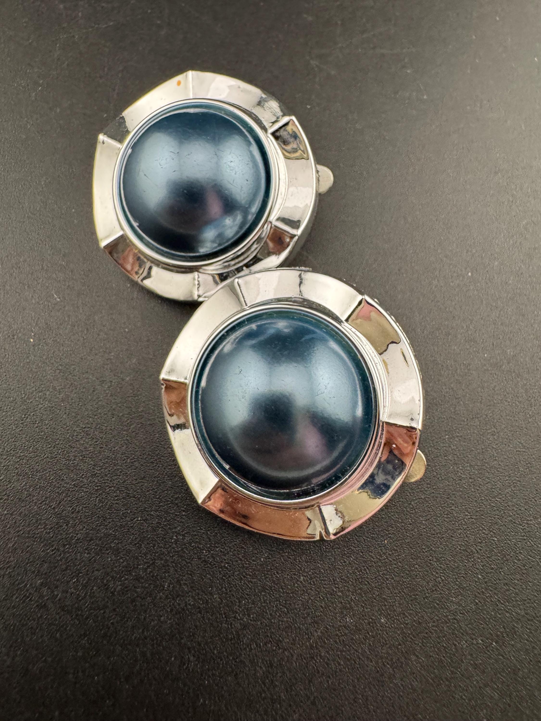 Vintage silver tone metal 2.5cm round clip on domed earrings with central faux grey blue faux pearl cabochons