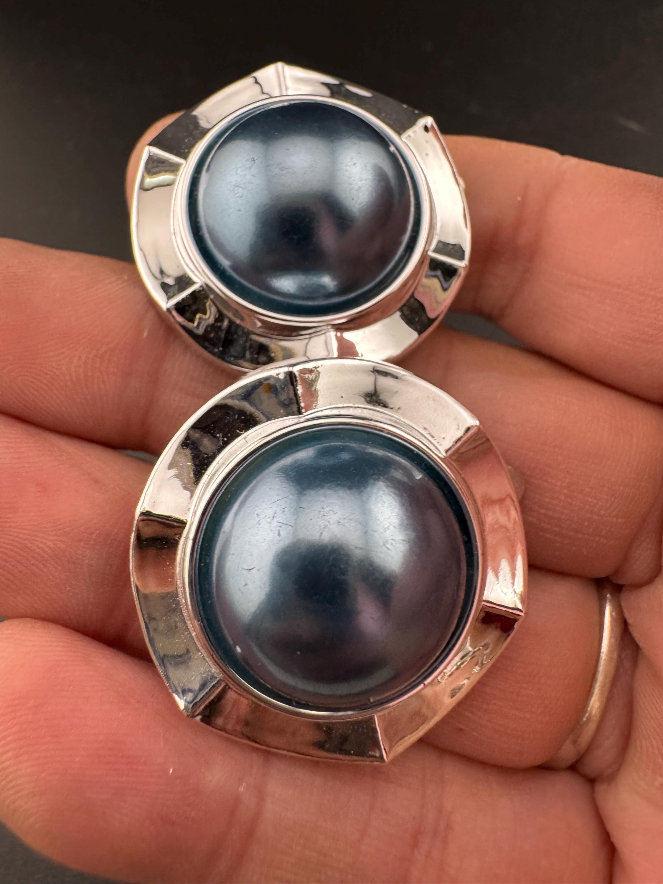 Vintage silver tone metal 2.5cm round clip on domed earrings with central faux grey blue faux pearl cabochons