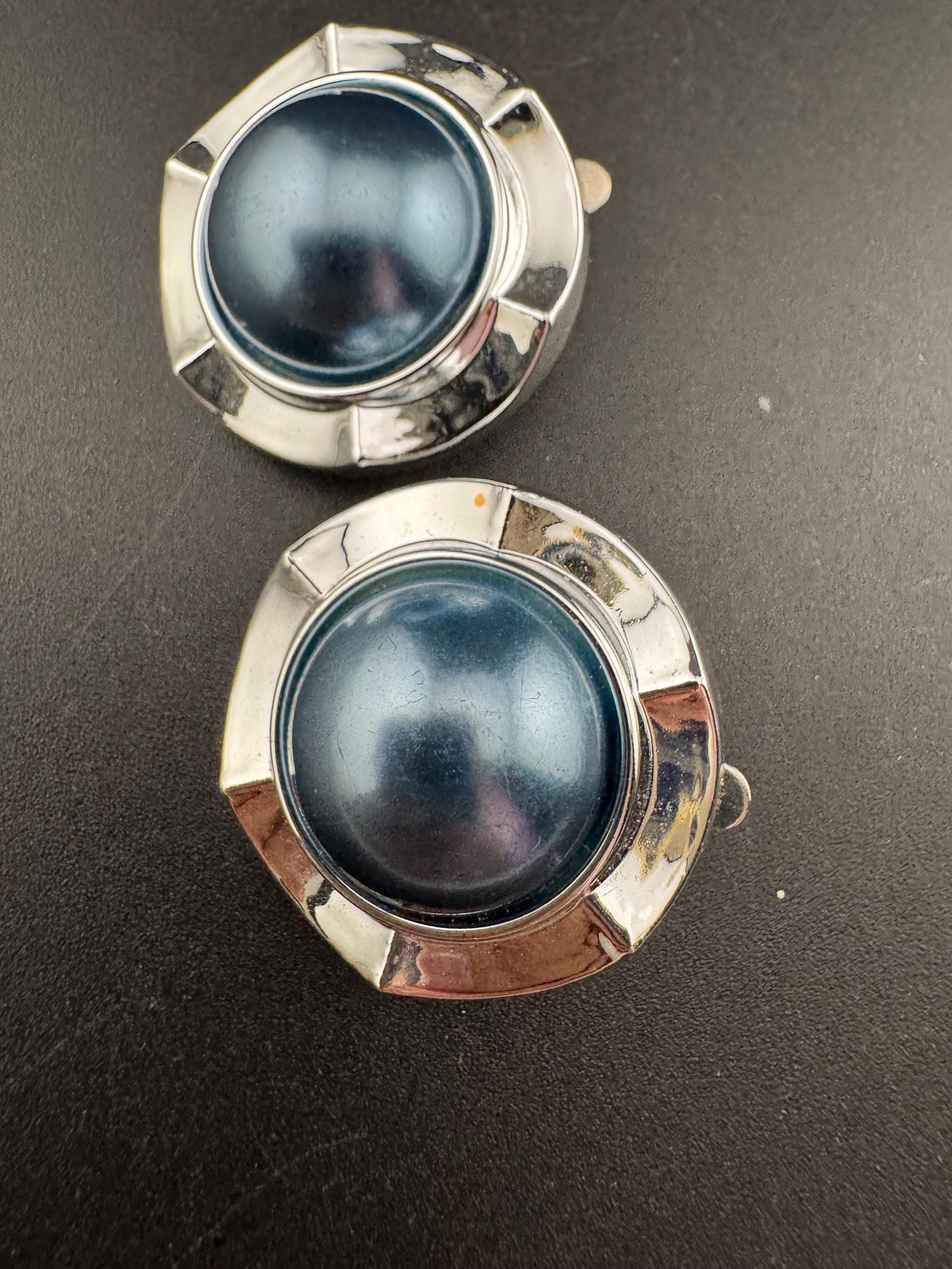 Vintage silver tone metal 2.5cm round clip on domed earrings with central faux grey blue faux pearl cabochons