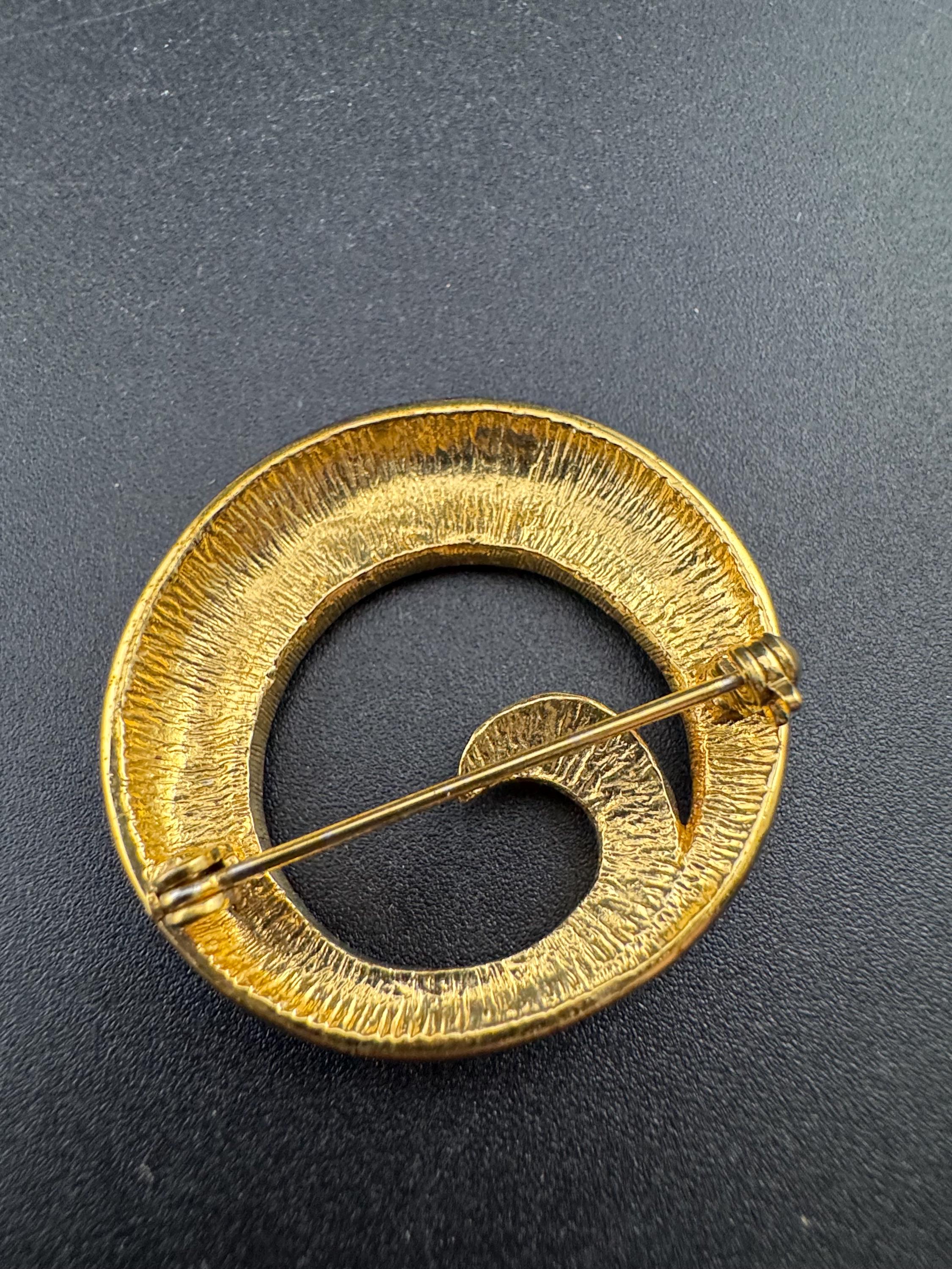 Vintage navy blue enamel diamanté gold tone abstract swirl detail brooch 1980s