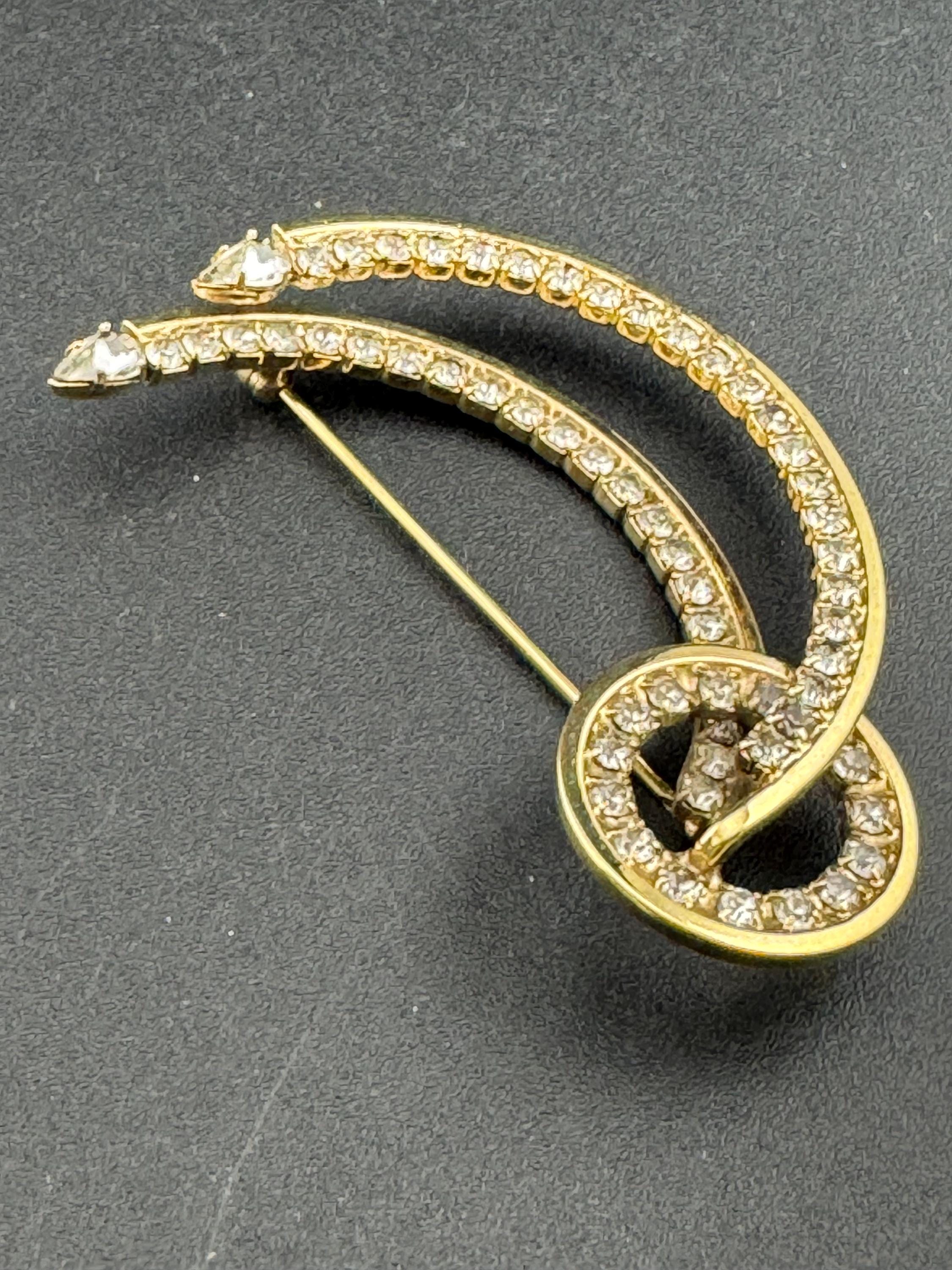 Large vintage stylish gold tone clear diamanté glass abstract swirl brooch