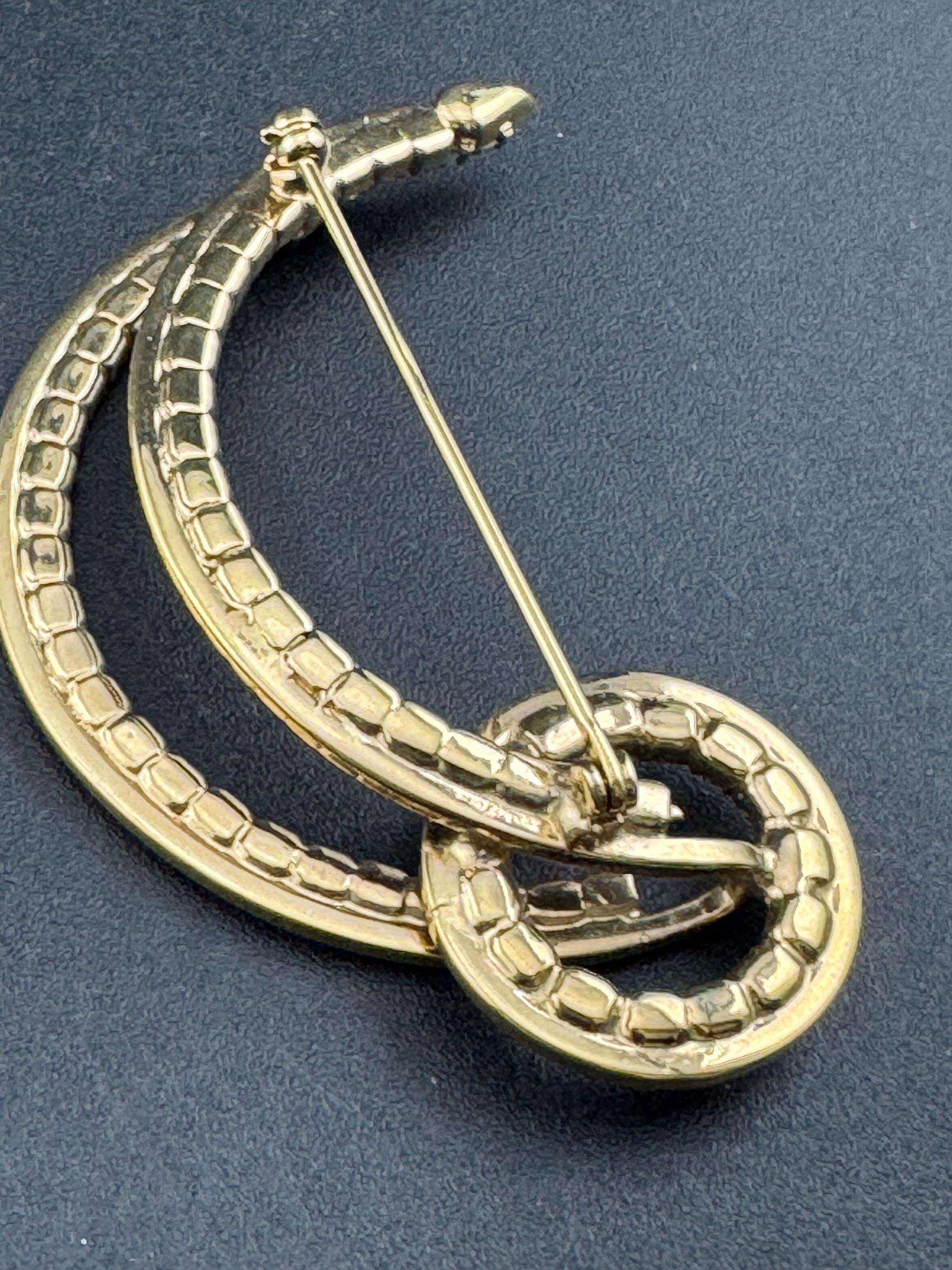 Large vintage stylish gold tone clear diamanté glass abstract swirl brooch