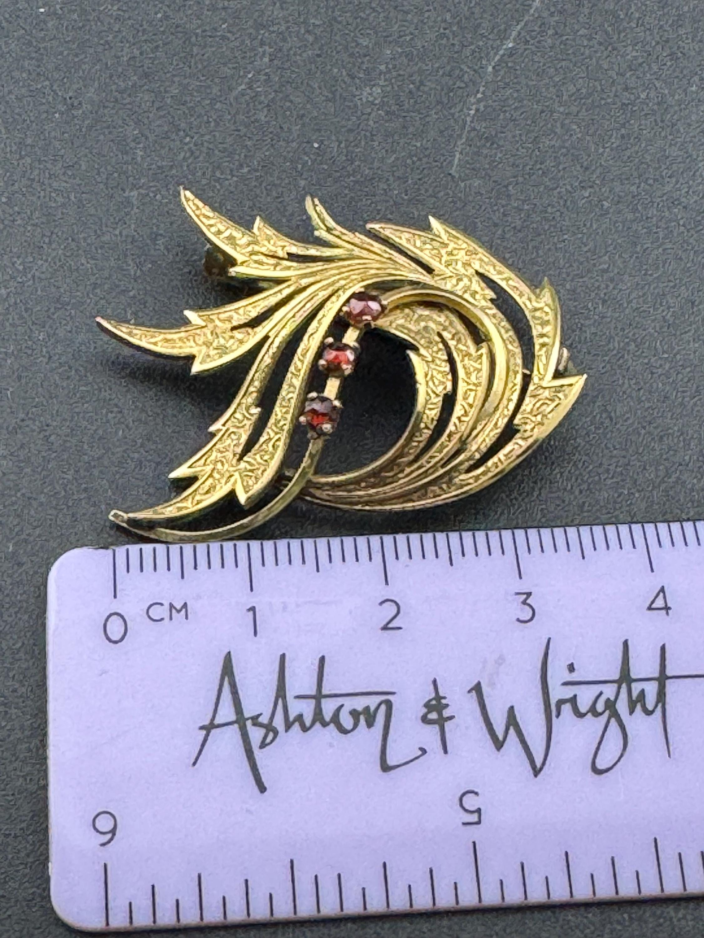 Signed A and D Rolled Gold textured abstract brooch with 3 garnet gemstones 1950s