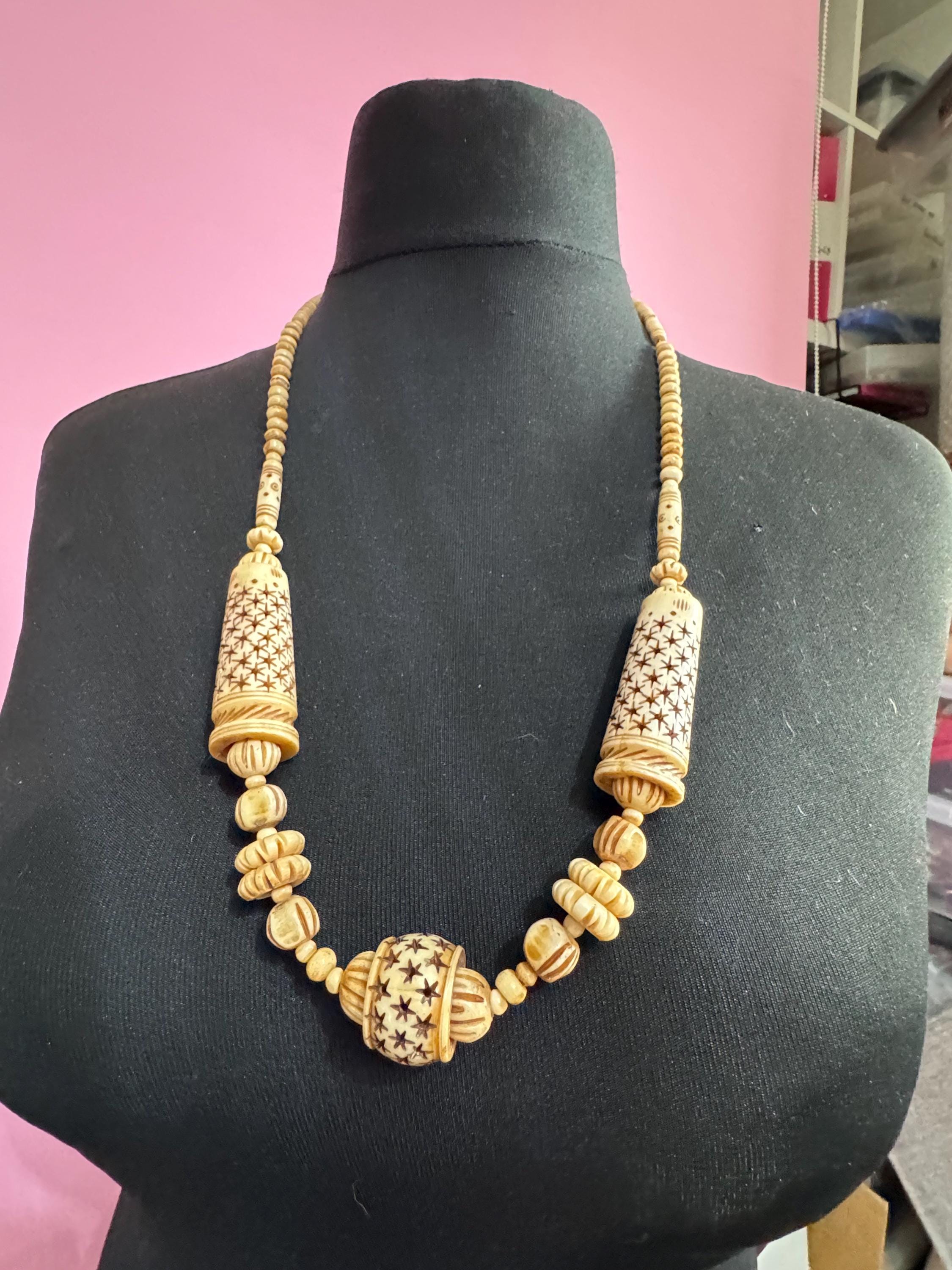 Vintage wide chunky carved stars,  beaded pendant necklace, tribal African cream faux bone or ivorine