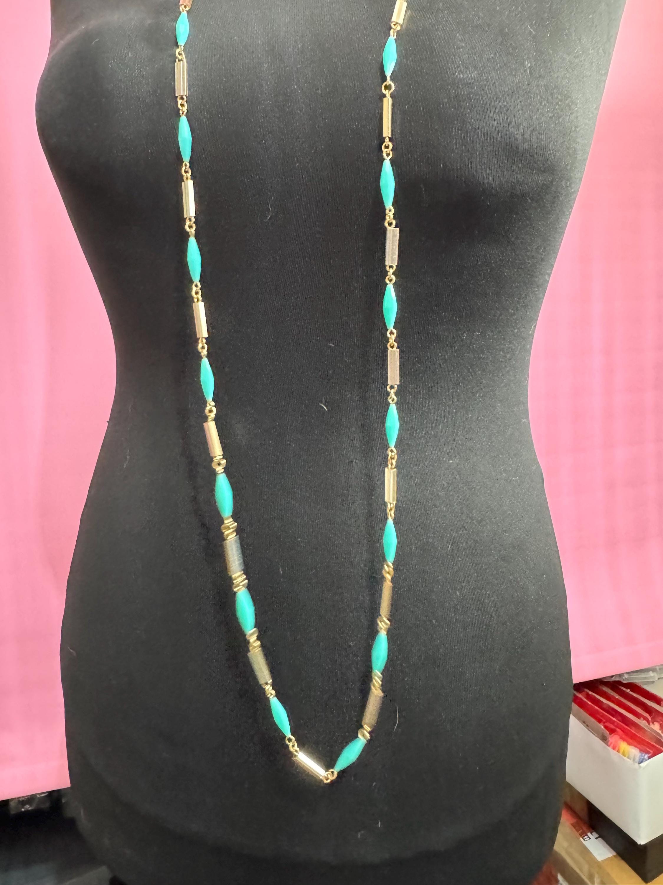 Vintage 60s 70s long plastic layering necklace. Turquoise blue beads with silver and gold tones