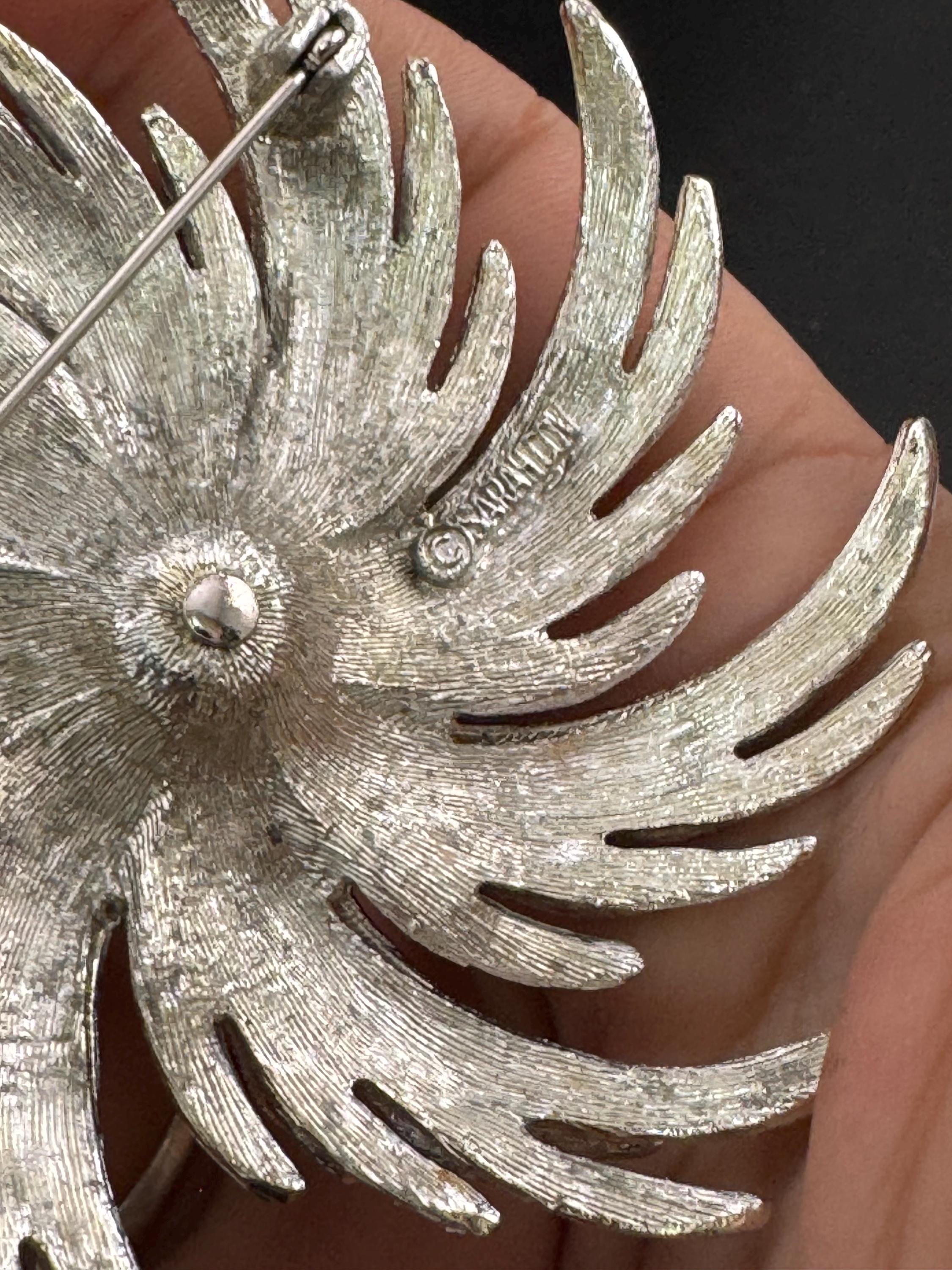 Signed Sarah Coventry modernist flower brooch silver tone with central Pearl cabochon