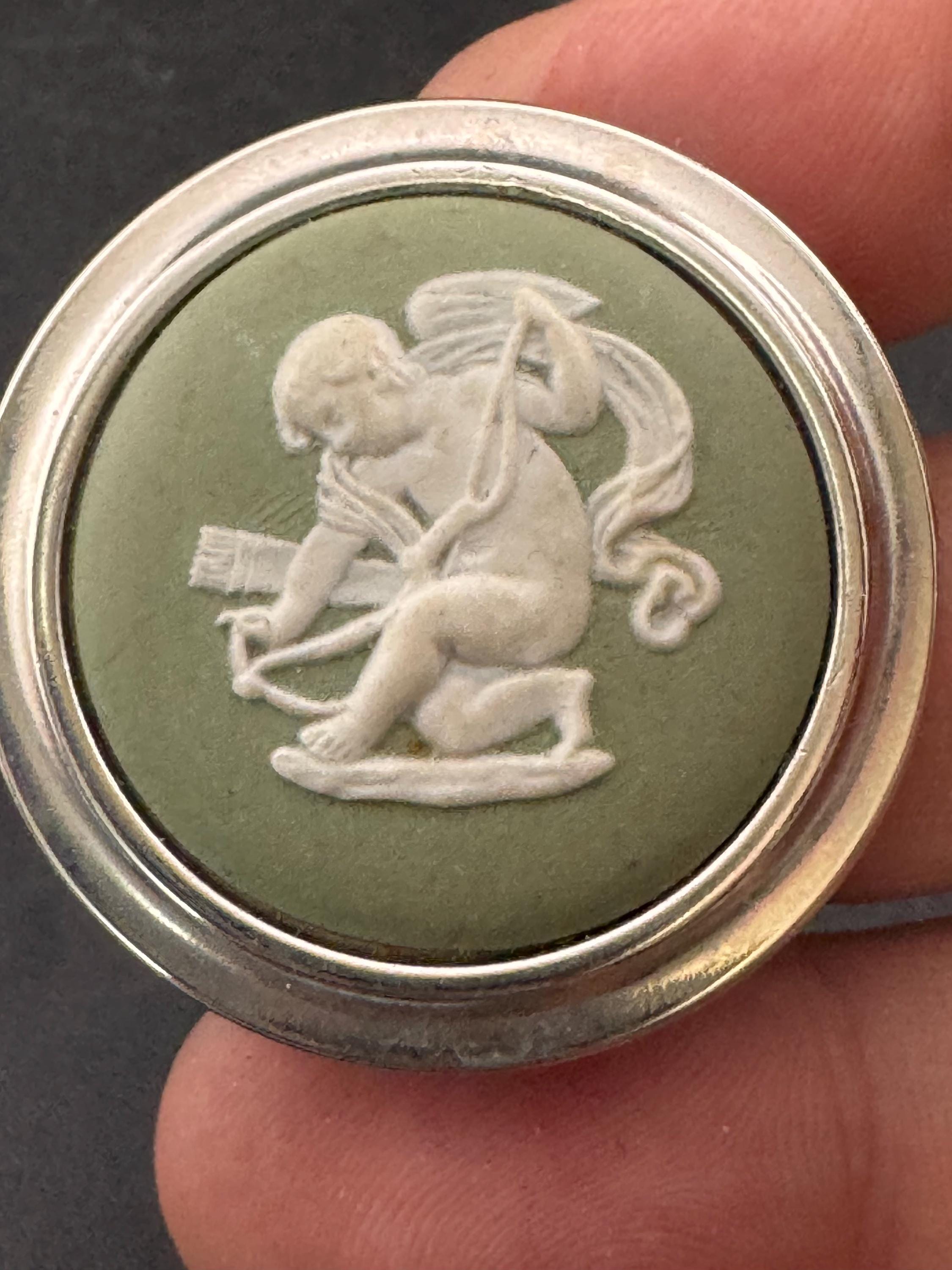 signed wedgwood green jasper ware  ceramic round cherub brooch with 925 silver surround