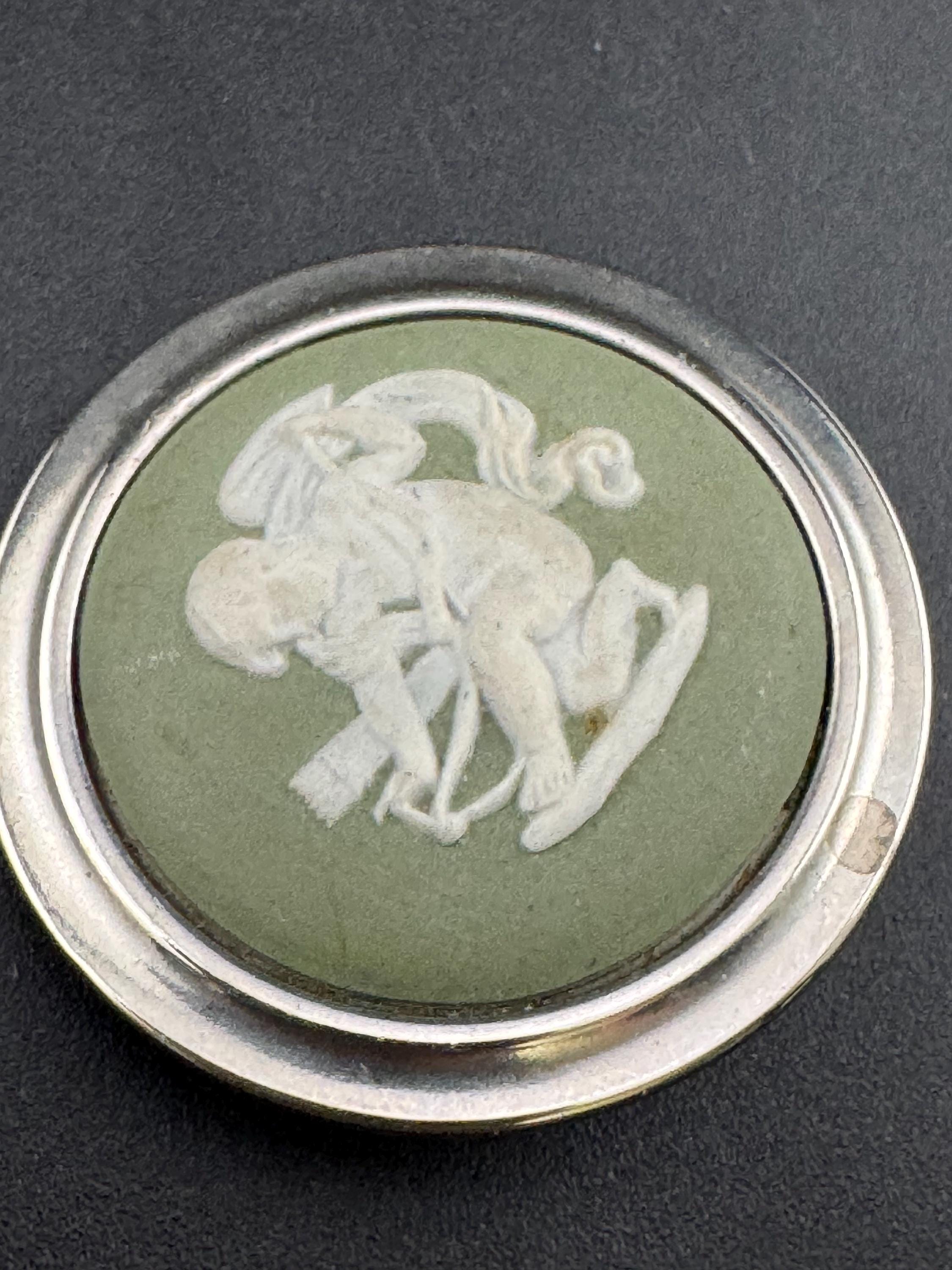 signed wedgwood green jasper ware  ceramic round cherub brooch with 925 silver surround