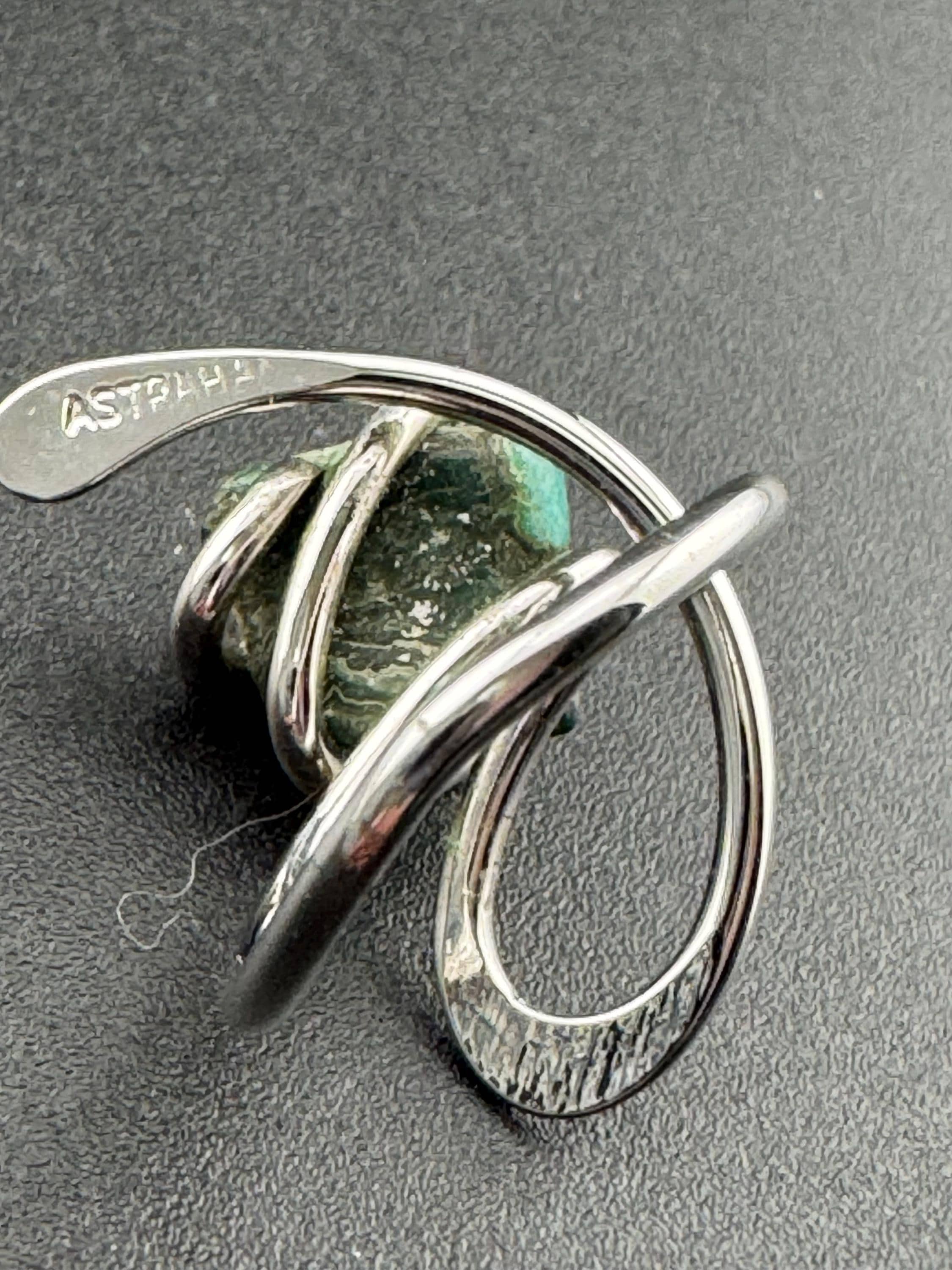 1970s vintage signed ASTRAHA modernist silver tone adjustable ring with central green gemstone