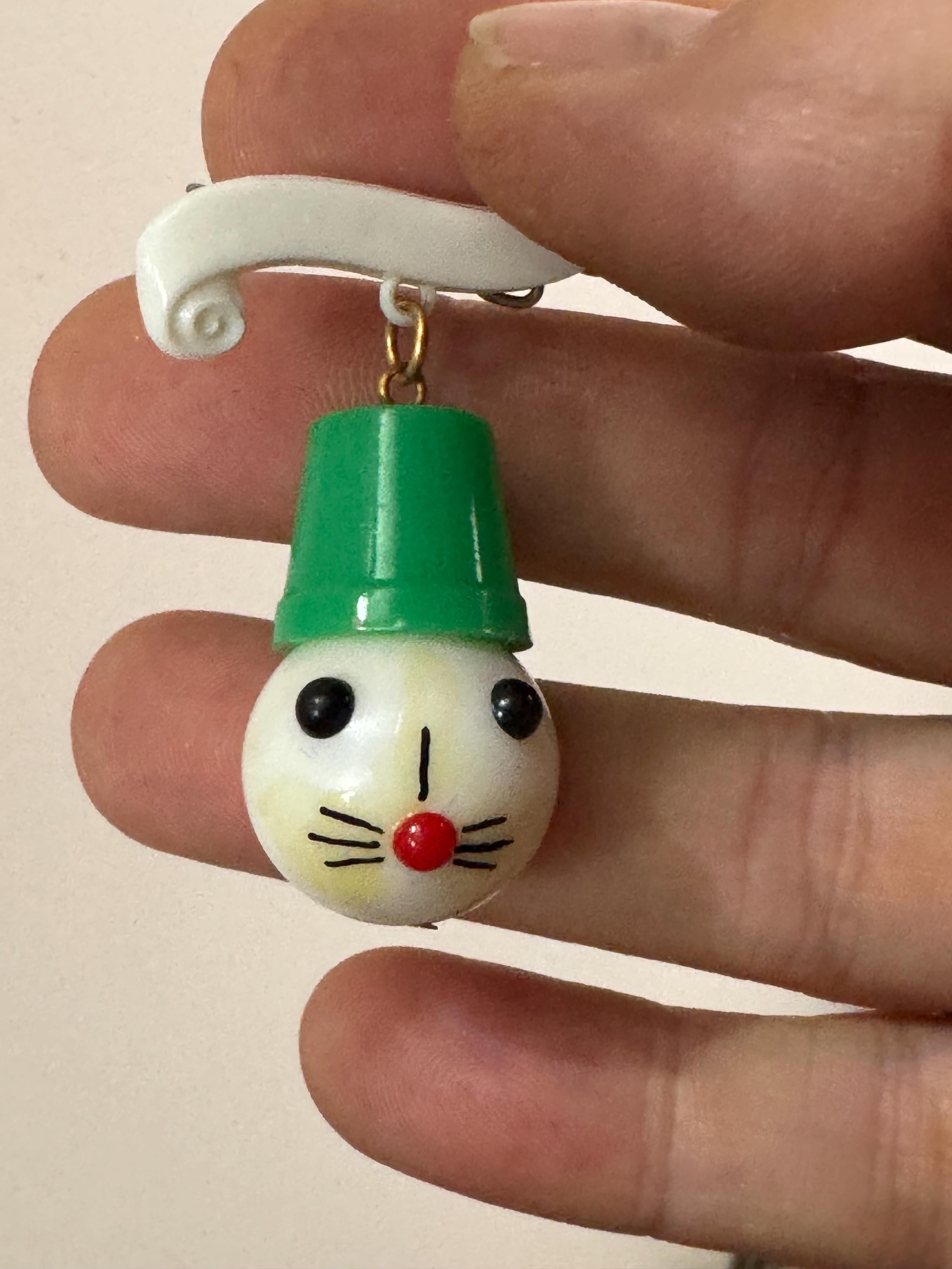Vintage 1940s kitsch cute Early Plastic dangly rabbit or mouse in a green hat brooch
