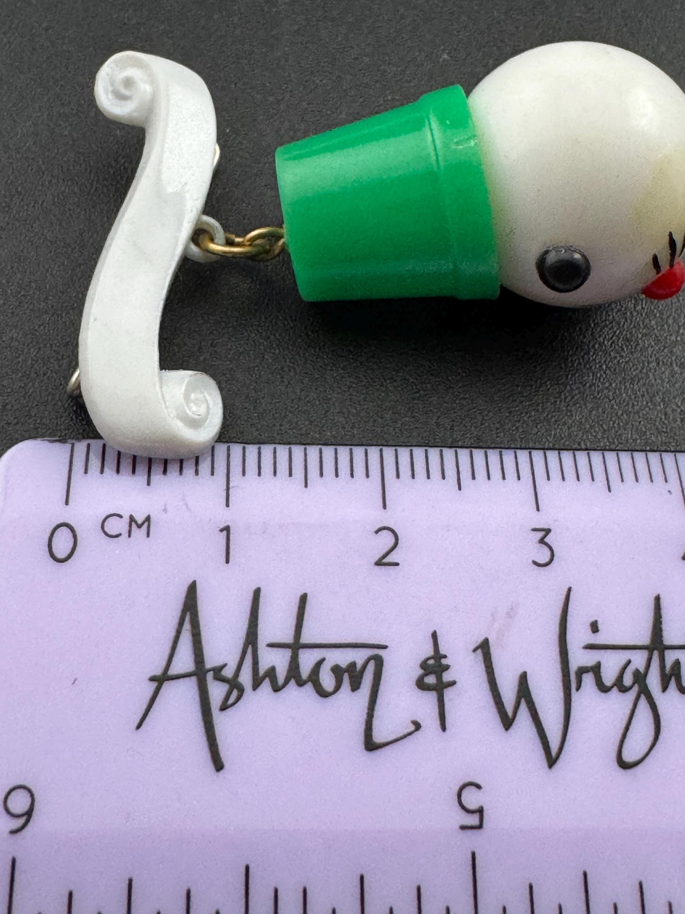 Vintage 1940s kitsch cute Early Plastic dangly rabbit or mouse in a green hat brooch