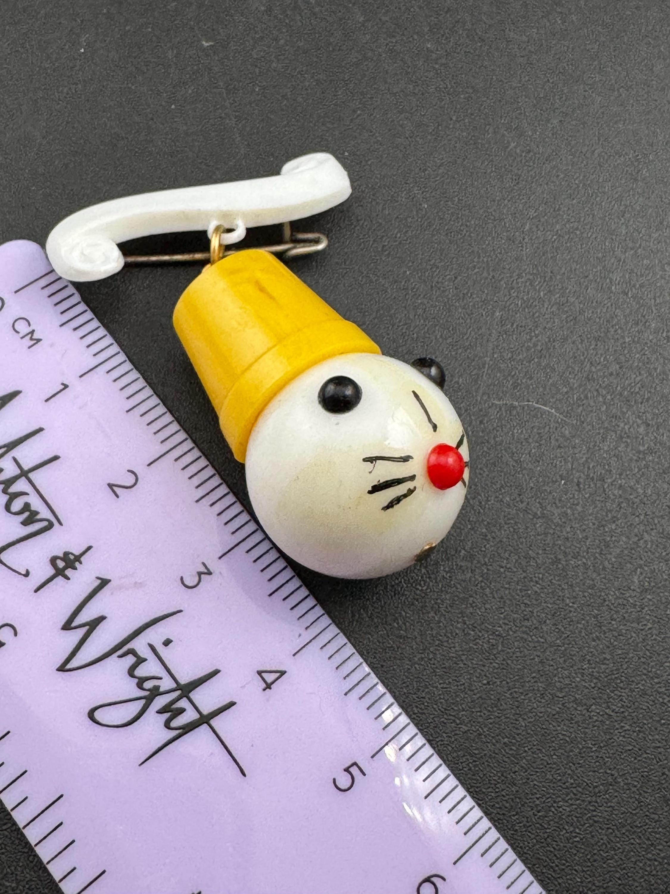 Vintage 1940s kitsch cute Early Plastic dangly rabbit or mouse in a yellow hat brooch