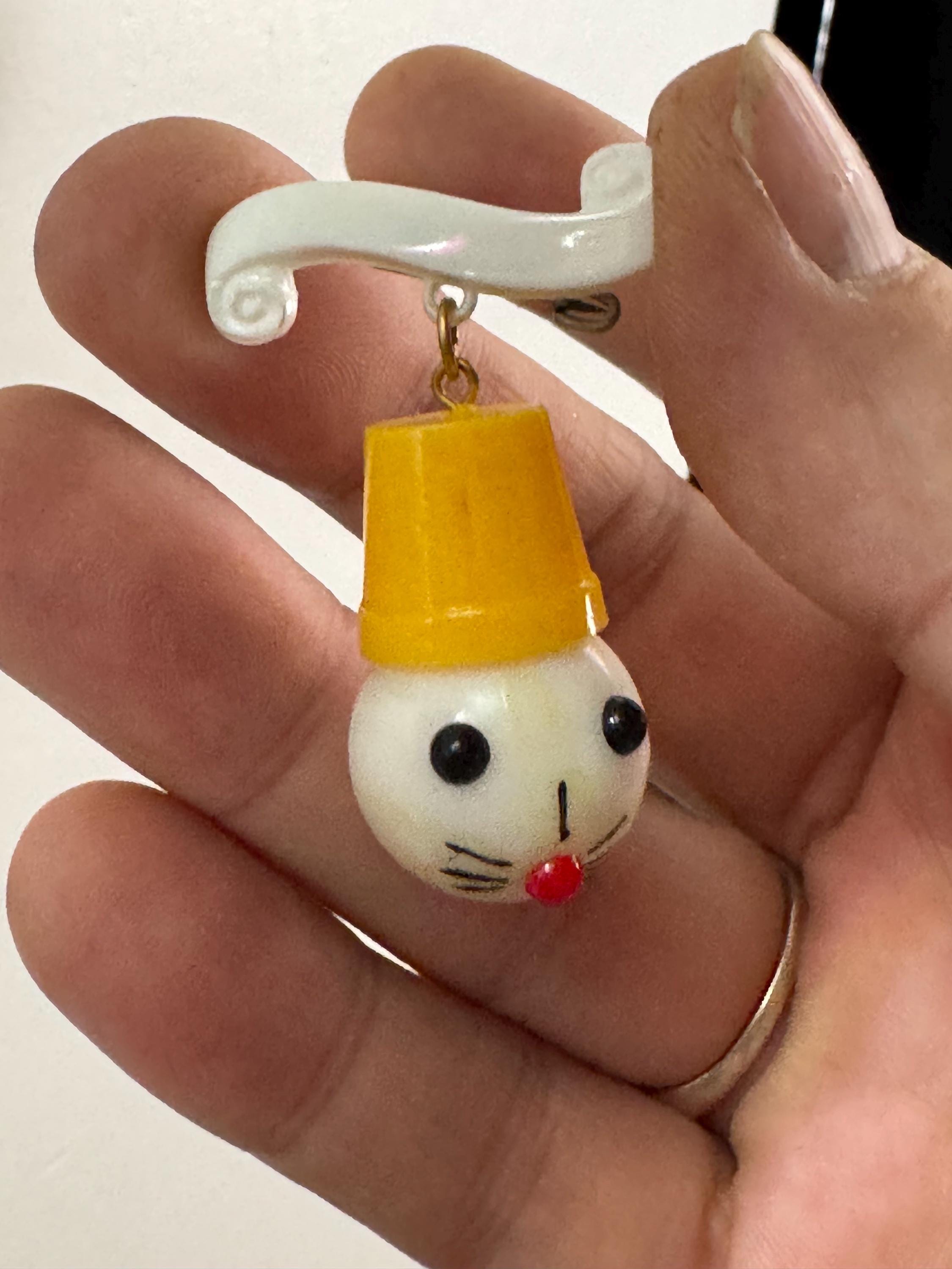 Vintage 1940s kitsch cute Early Plastic dangly rabbit or mouse in a yellow hat brooch