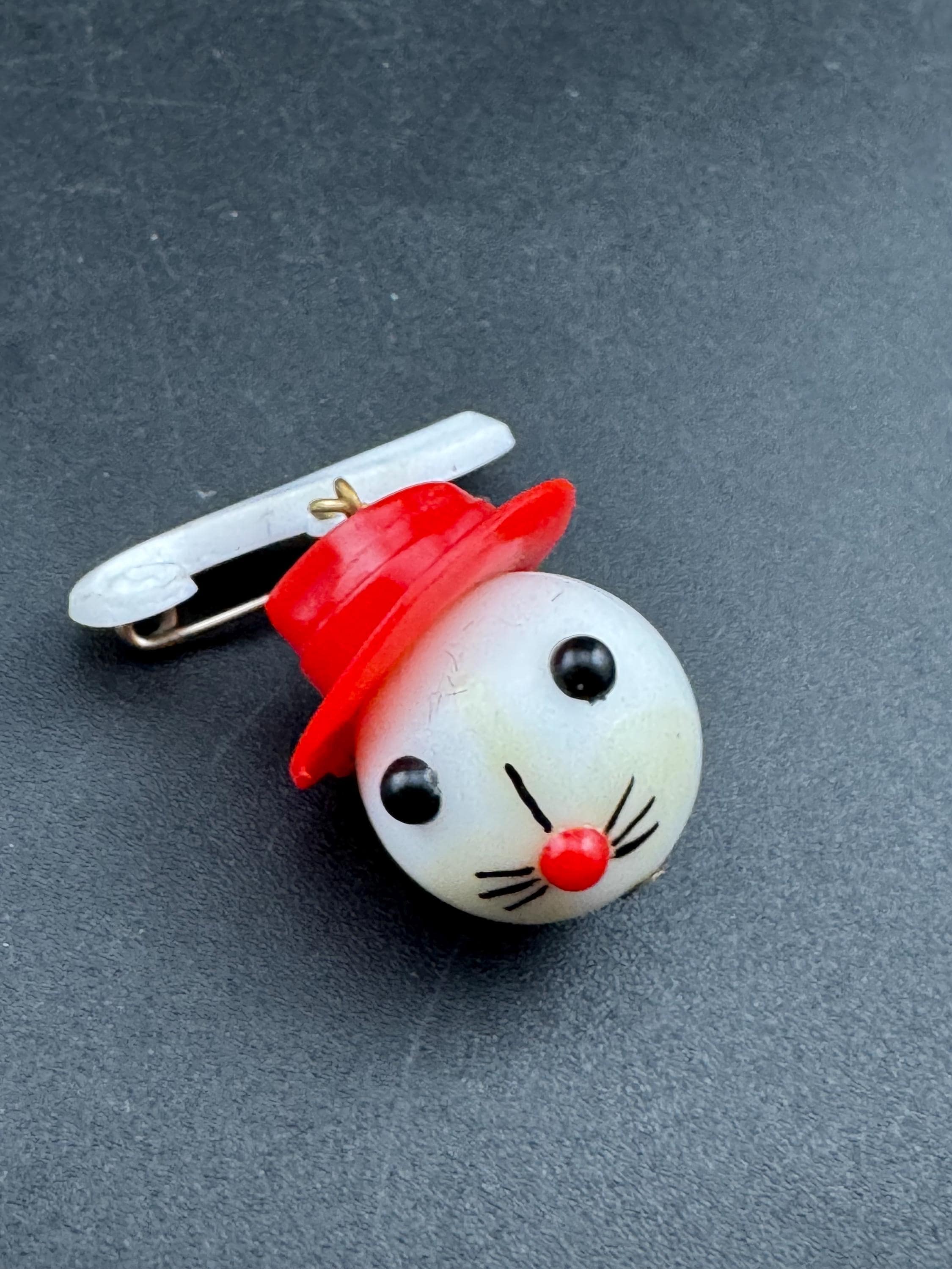 Vintage 1940s kitsch cute Early Plastic dangly rabbit or mouse in a red hat brooch