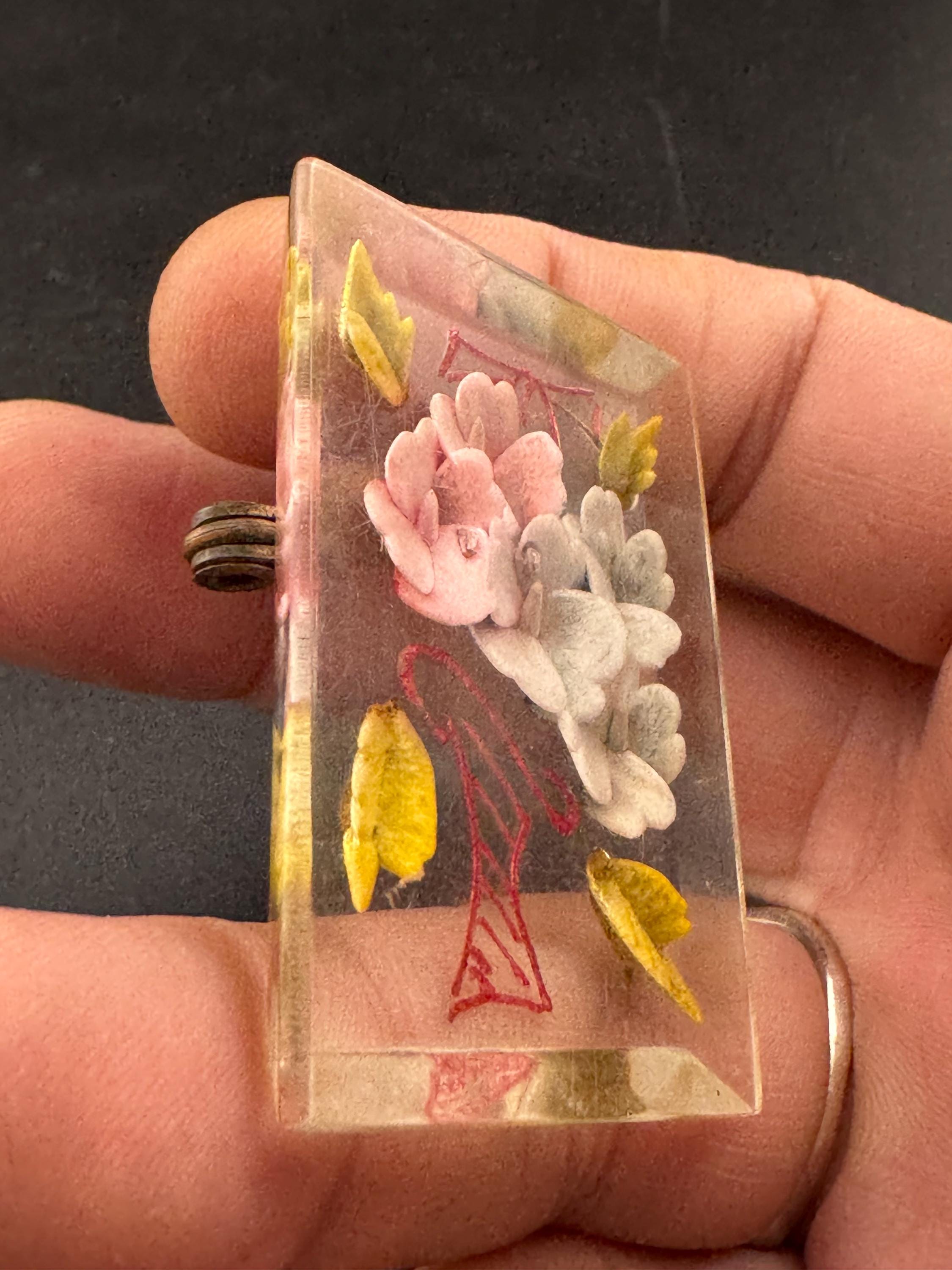 pink floral lucite brooch early plastic pink blue celluloid 1930s Vintage reverse carved