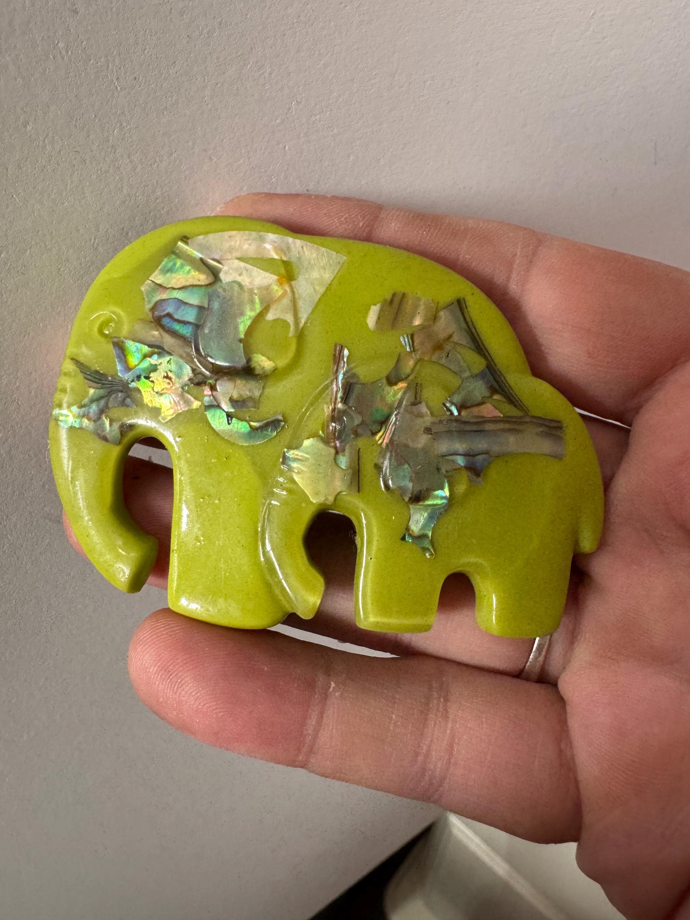 big lime green elephant and baby brooch inset with abalone shell, early plastic 1960s