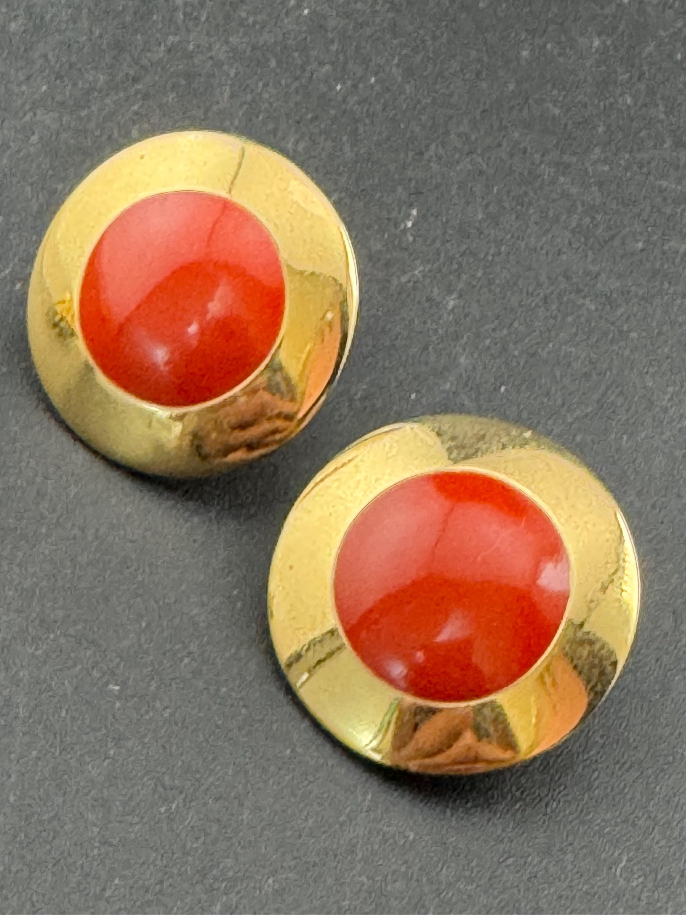 Signed MONET Gold tone deep red enamel low domed disc clip on earrings