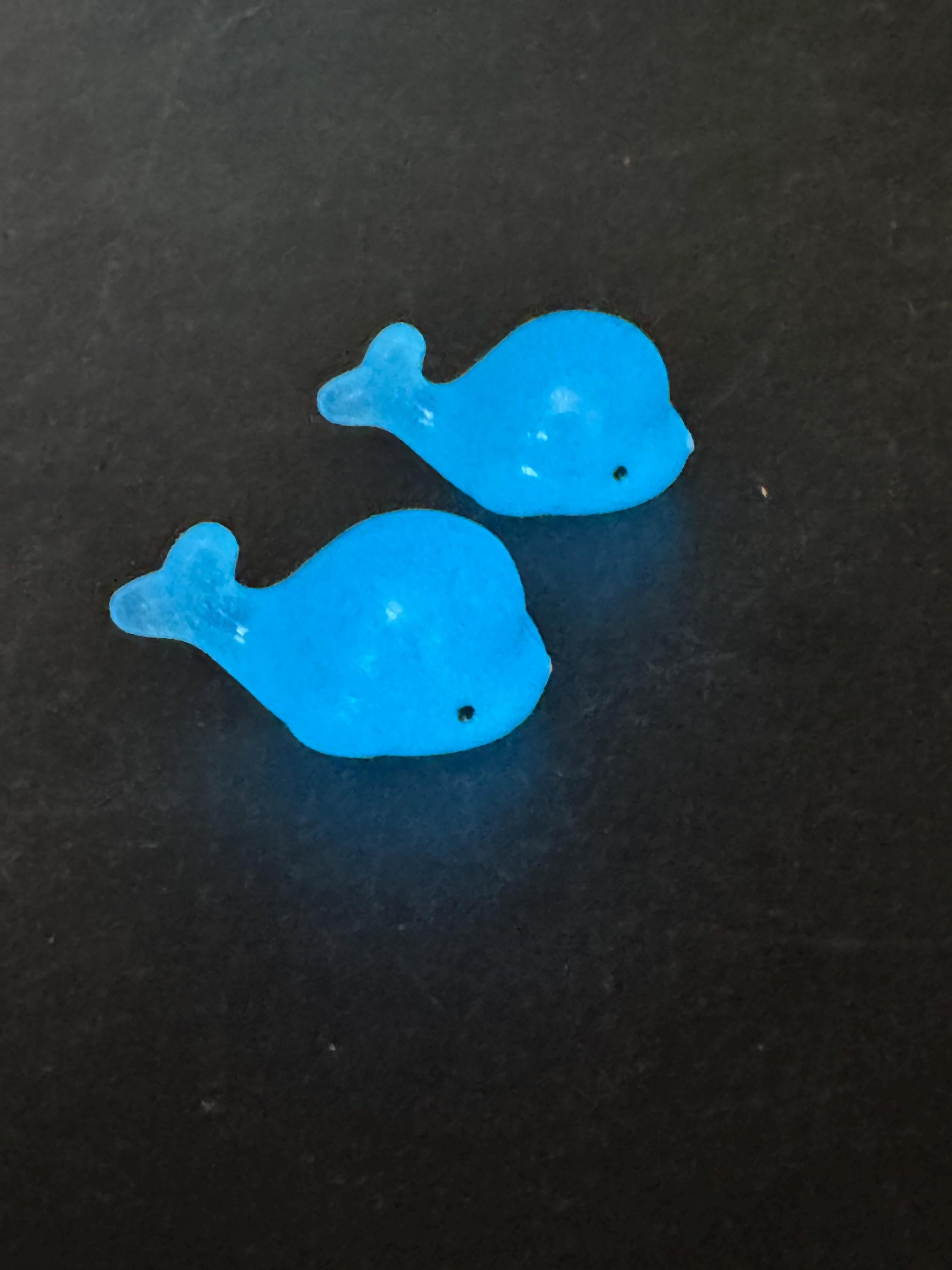 2 pieces of miniature glow in the dark blue sharks seaside cake topper