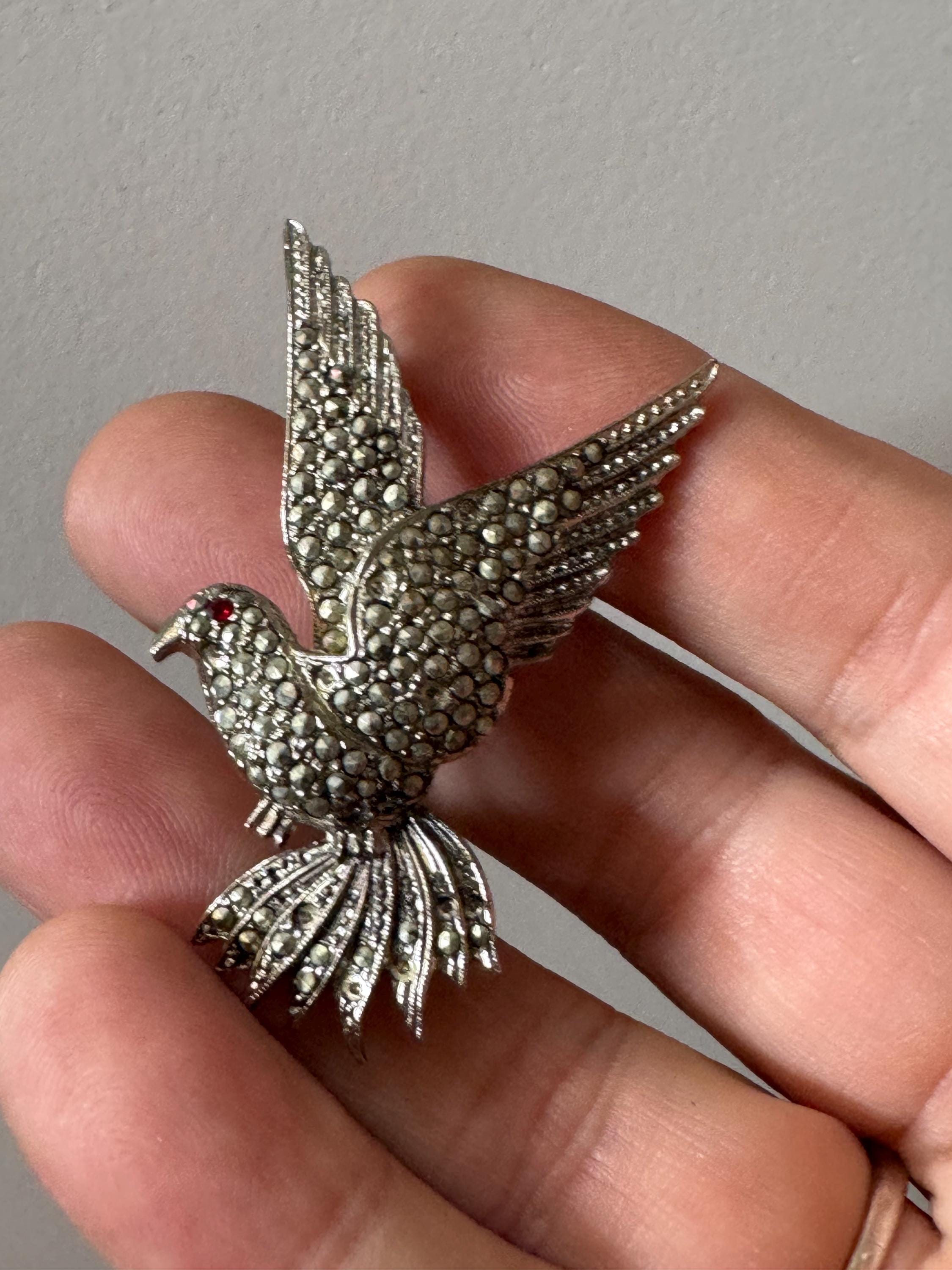 Vintage Marcasite bird brooch with ruby eyes silver tone mid century