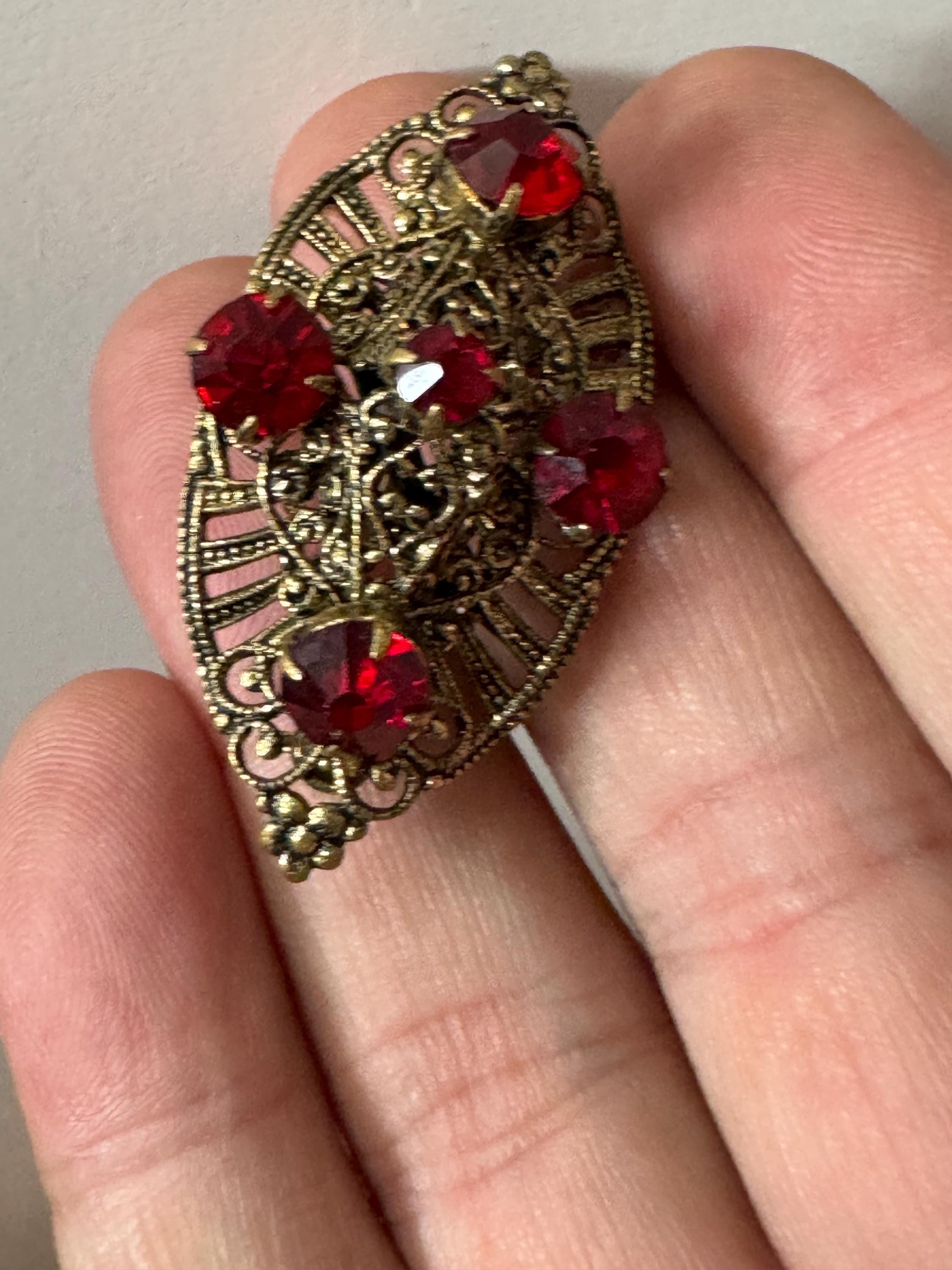 Antique Art Deco Czech brass gilt metal filigree brooch with red faux ruby glass paste rhinestones ornate